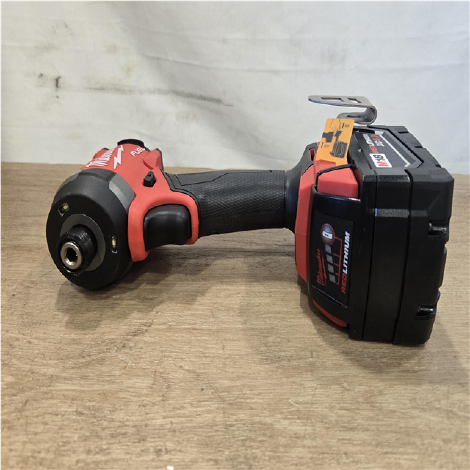 AS-IS Milwaukee FUEL 18V Lithium-Ion Brushless Cordless Hammer Drill and Impact Driver Combo Kit