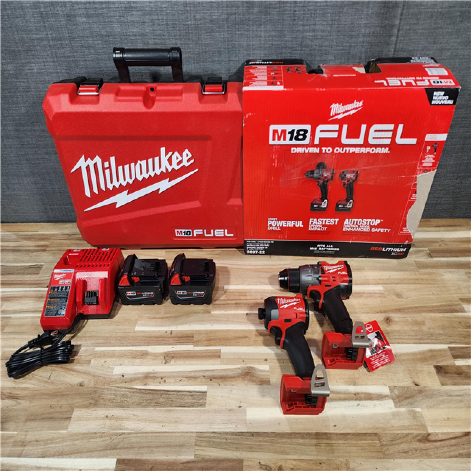 HOUSTON LOCATION - AS-IS (APPEARS LIKE NEW) Milwaukee  FUEL 18V Lithium-Ion Brushless Cordless Hammer Drill and Impact Driver Combo Kit