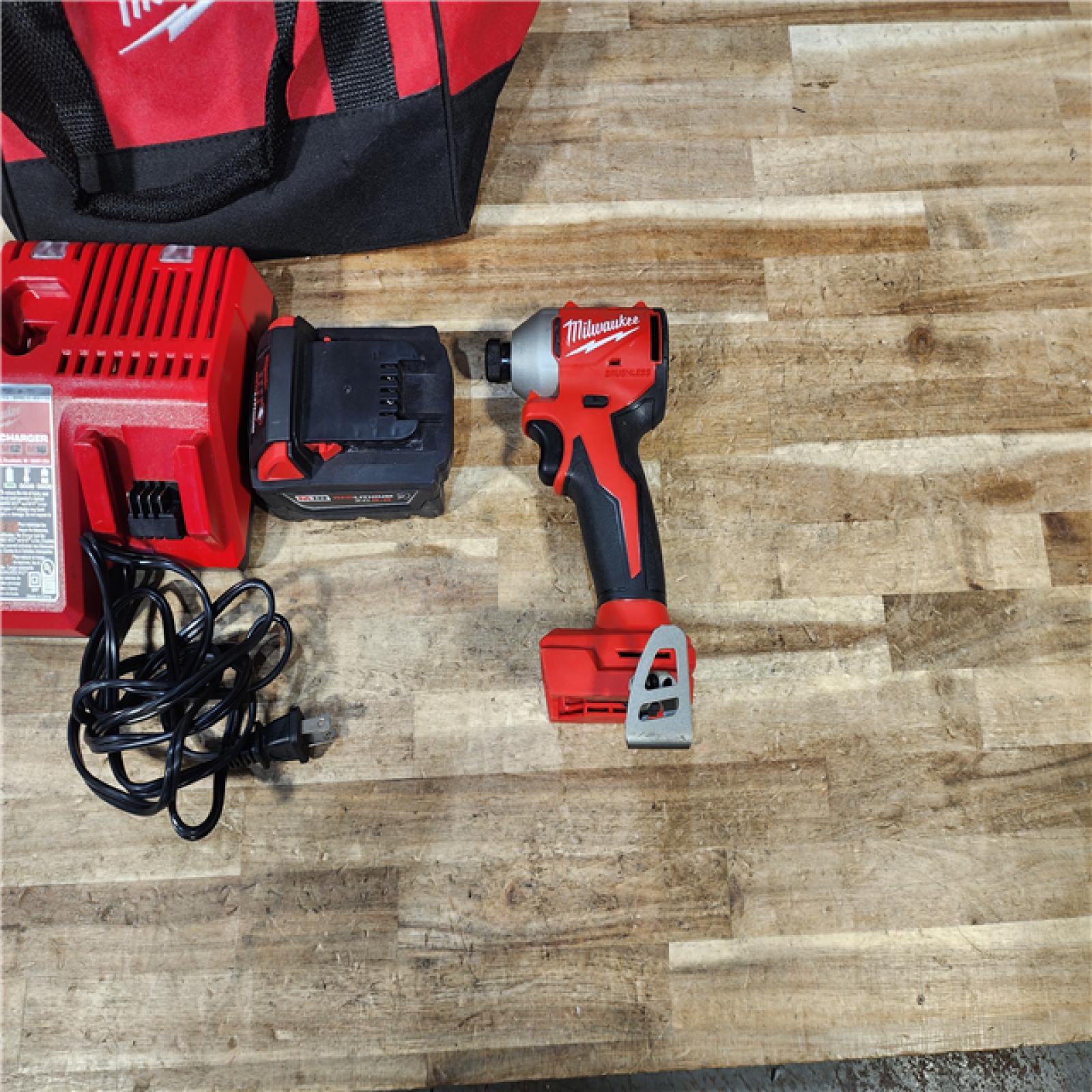 HOUSTON LOCATION - AS - IS Milwaukee 18-Volt Lithium-Ion Compact Brushless Cordless 1/4 in. Impact Driver Kit