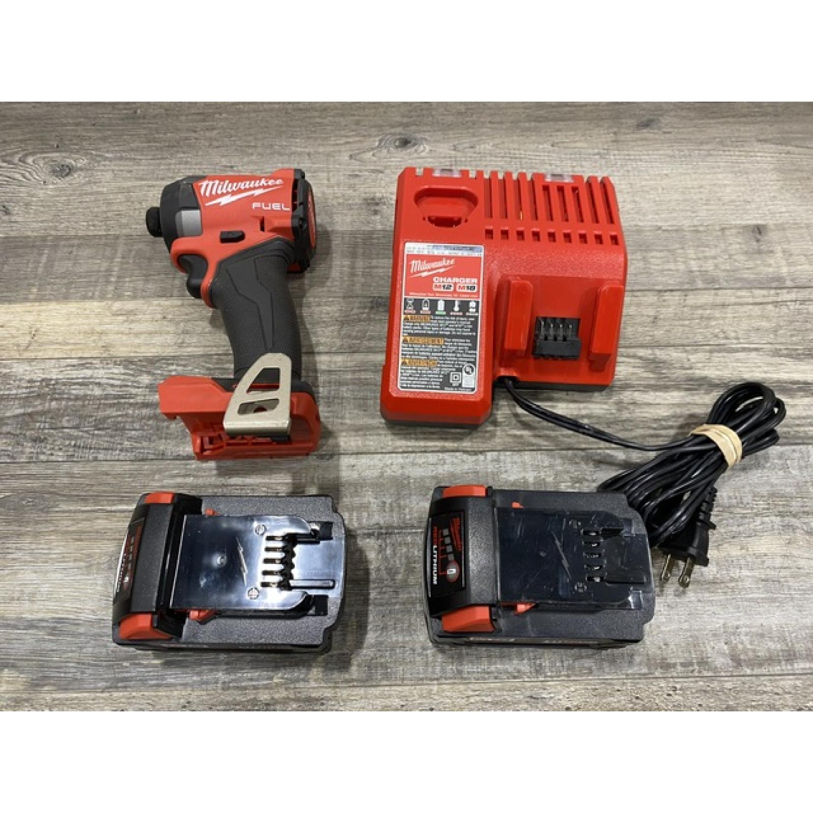 AS-IS Milwaukee FUEL 18V Lithium-Ion Brushless Cordless 1/4 in. Hex Impact Driver Kit