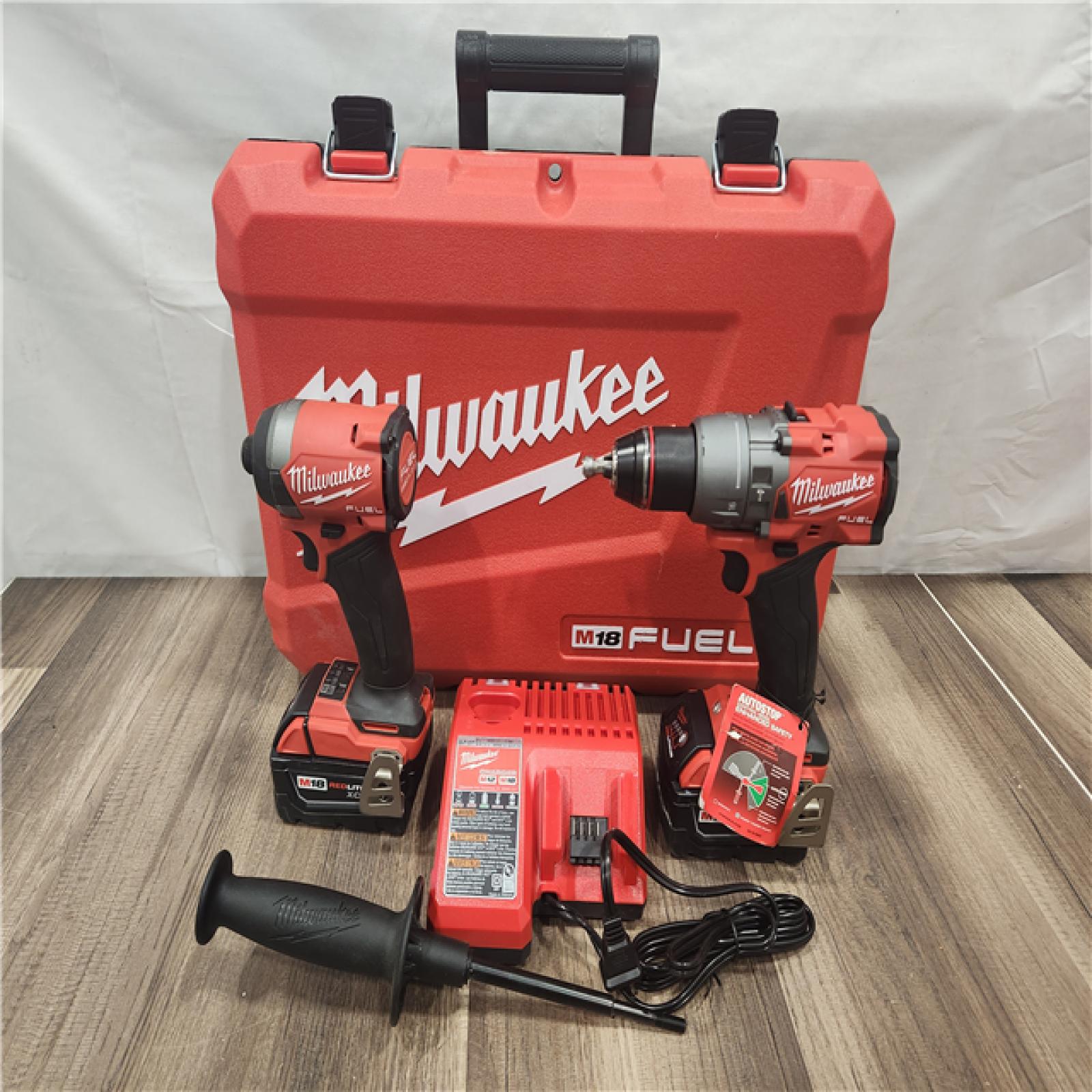 AS-IS- MILWAUKEE FUEL 18V Lithium-Ion Brushless Cordless Hammer Drill and Impact Driver Combo Kit