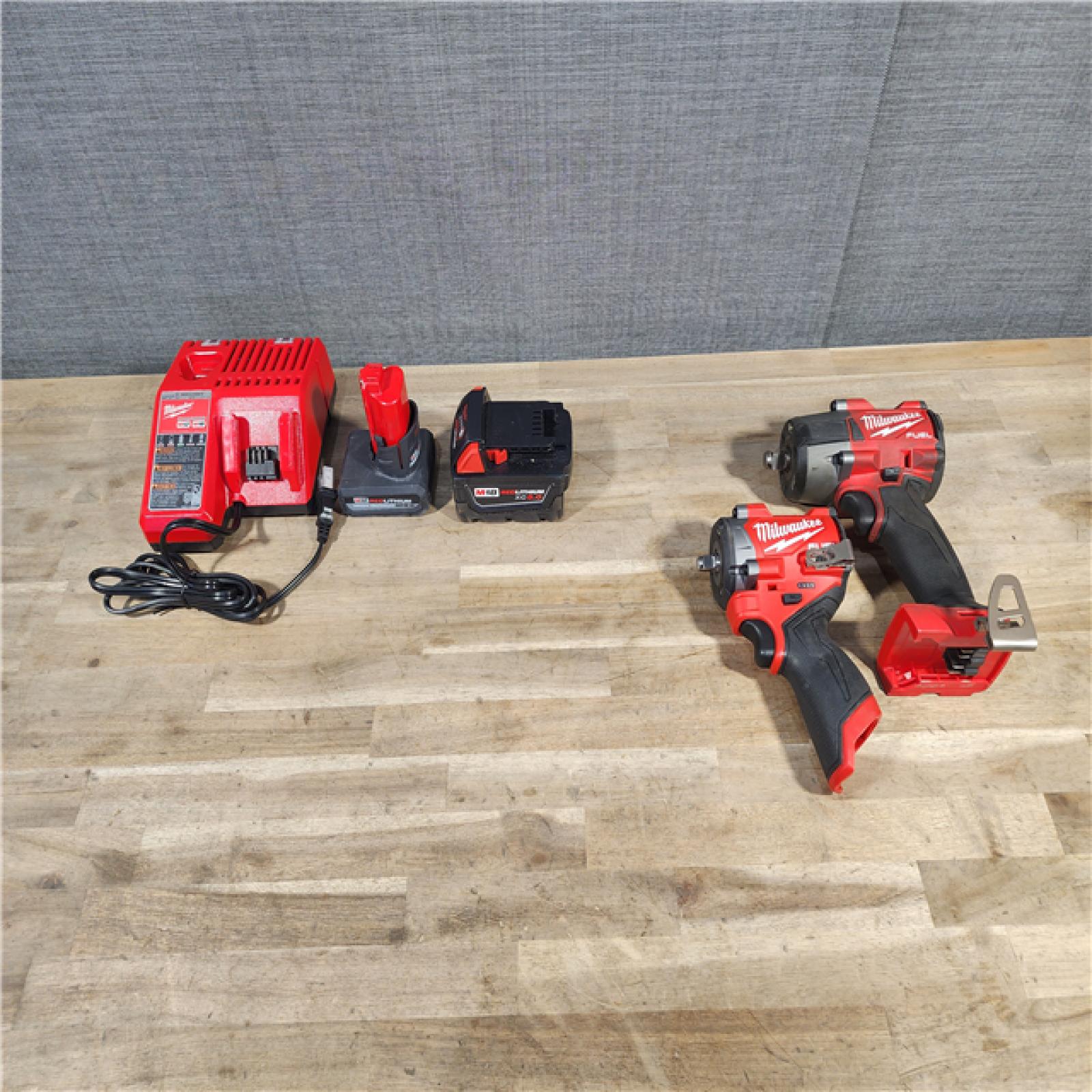 HOUSTON LOCATION - AS-IS Milwaukee 2 Tool Combo Kit W/ (2) Battery & Charger