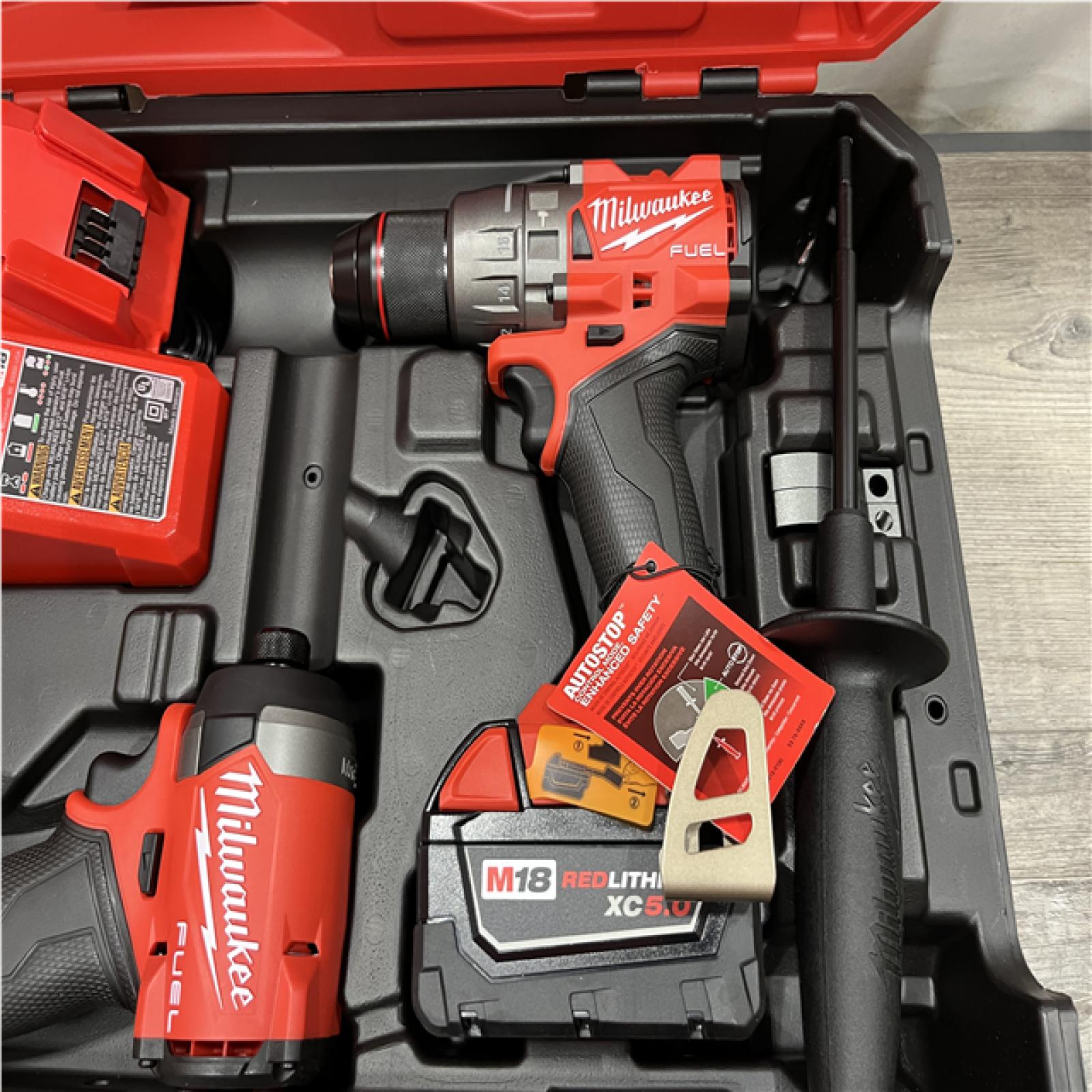 AS-IS  Milwaukee FUEL 18V Lithium-Ion Brushless Cordless Hammer Drill and Impact Driver Combo Kit