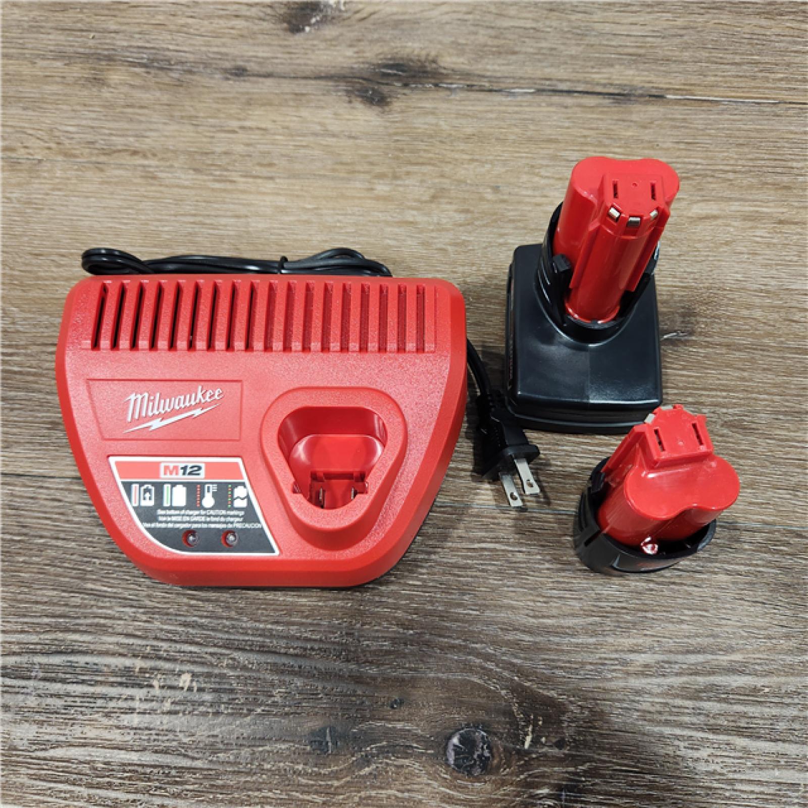 AS-IS Milwaukee M12 12-Volt Lithium-Ion 4.0 Ah and 2.0 Ah Battery Packs and Charger Starter Kit (48-59-2424)
