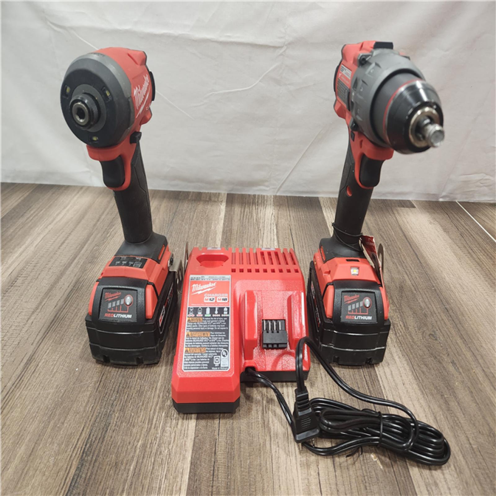 AS-IS- MILWAUKEE FUEL 18V Lithium-Ion Brushless Cordless Hammer Drill and Impact Driver Combo Kit