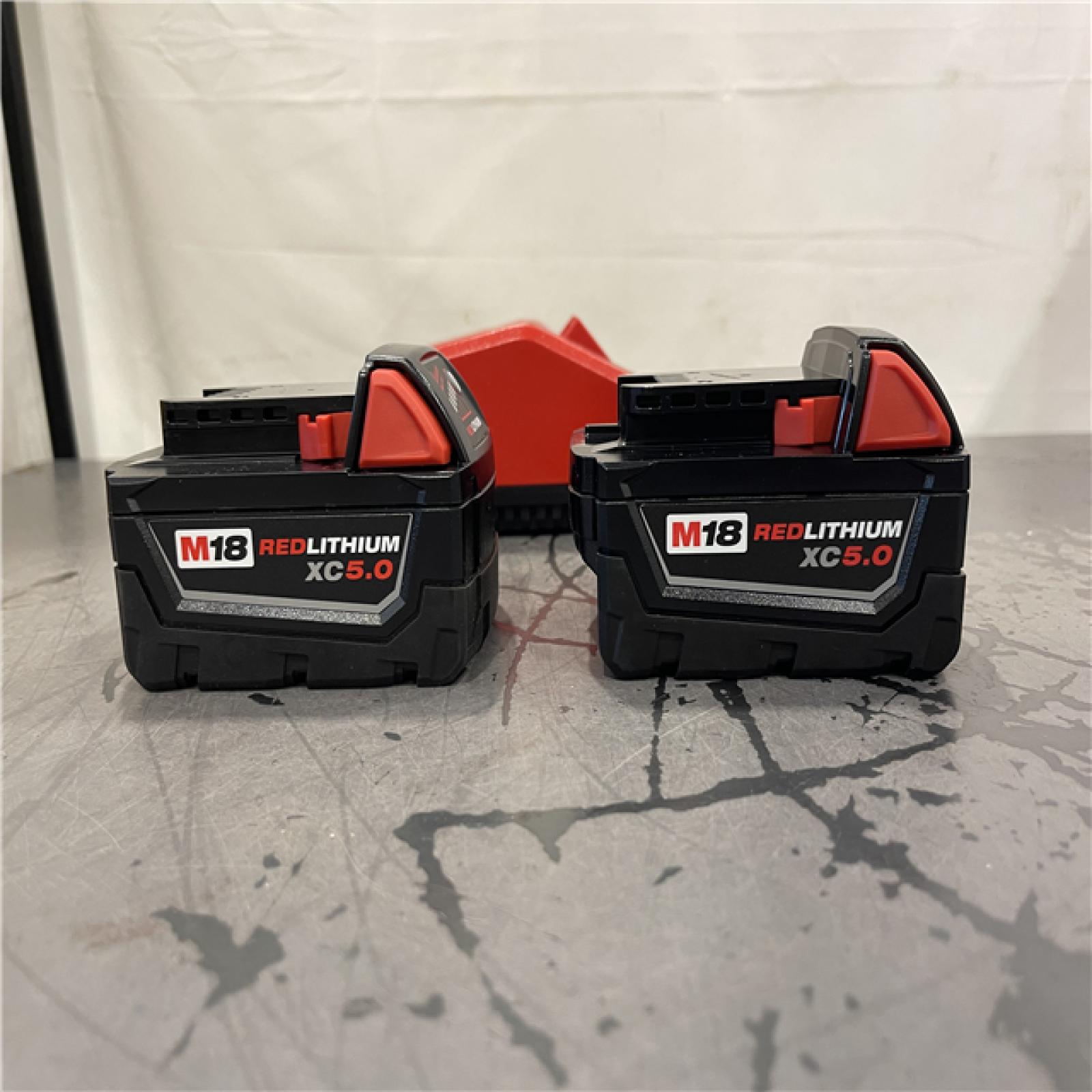 AS-IS- Milwaukee M18 18-Volt Lithium-Ion XC Starter Kit with Two 5.0Ah Batteries and Charger