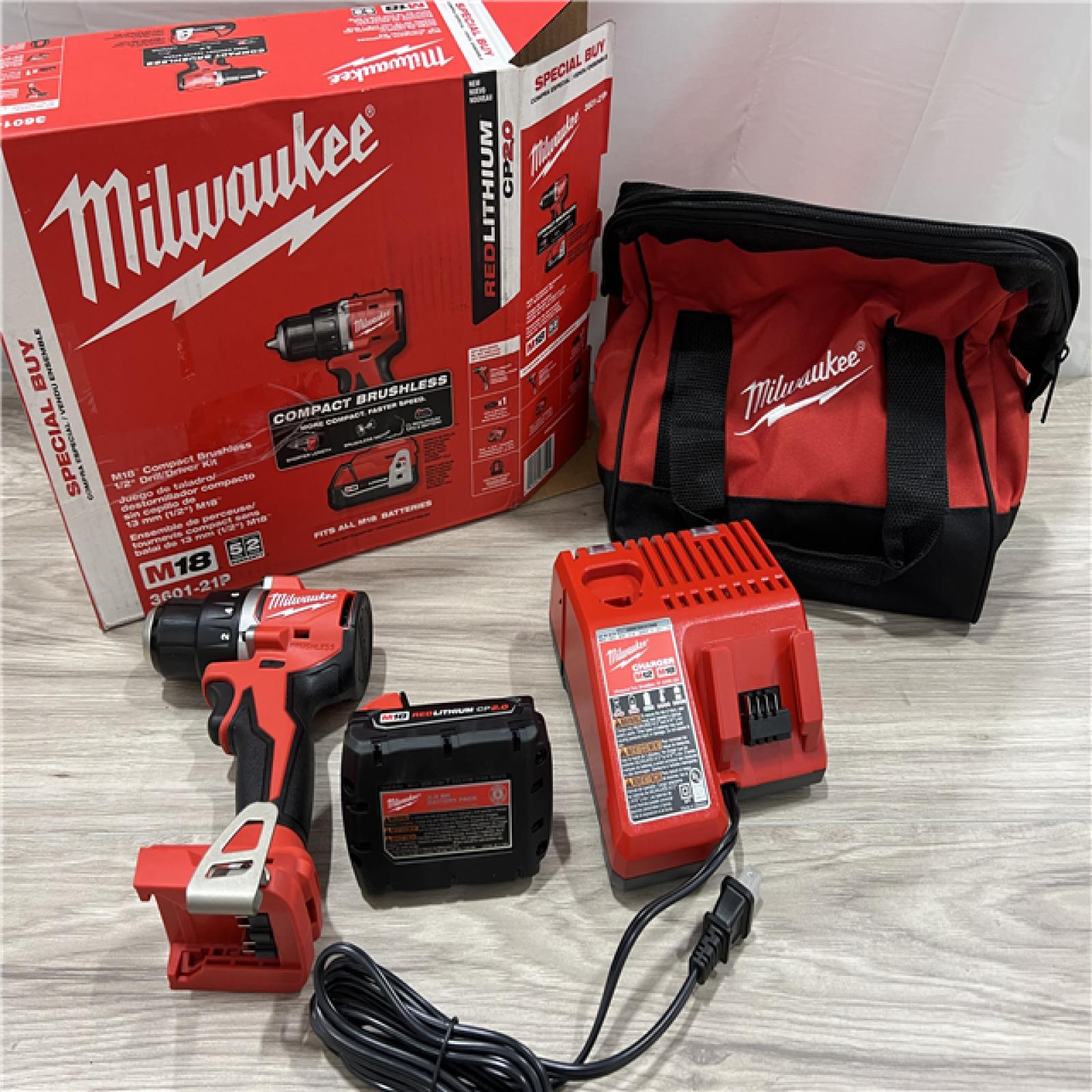 AS-IS Milwaukee 18V Lithium-Ion Brushless Cordless 1/2 in. Compact Drill/Driver with kit