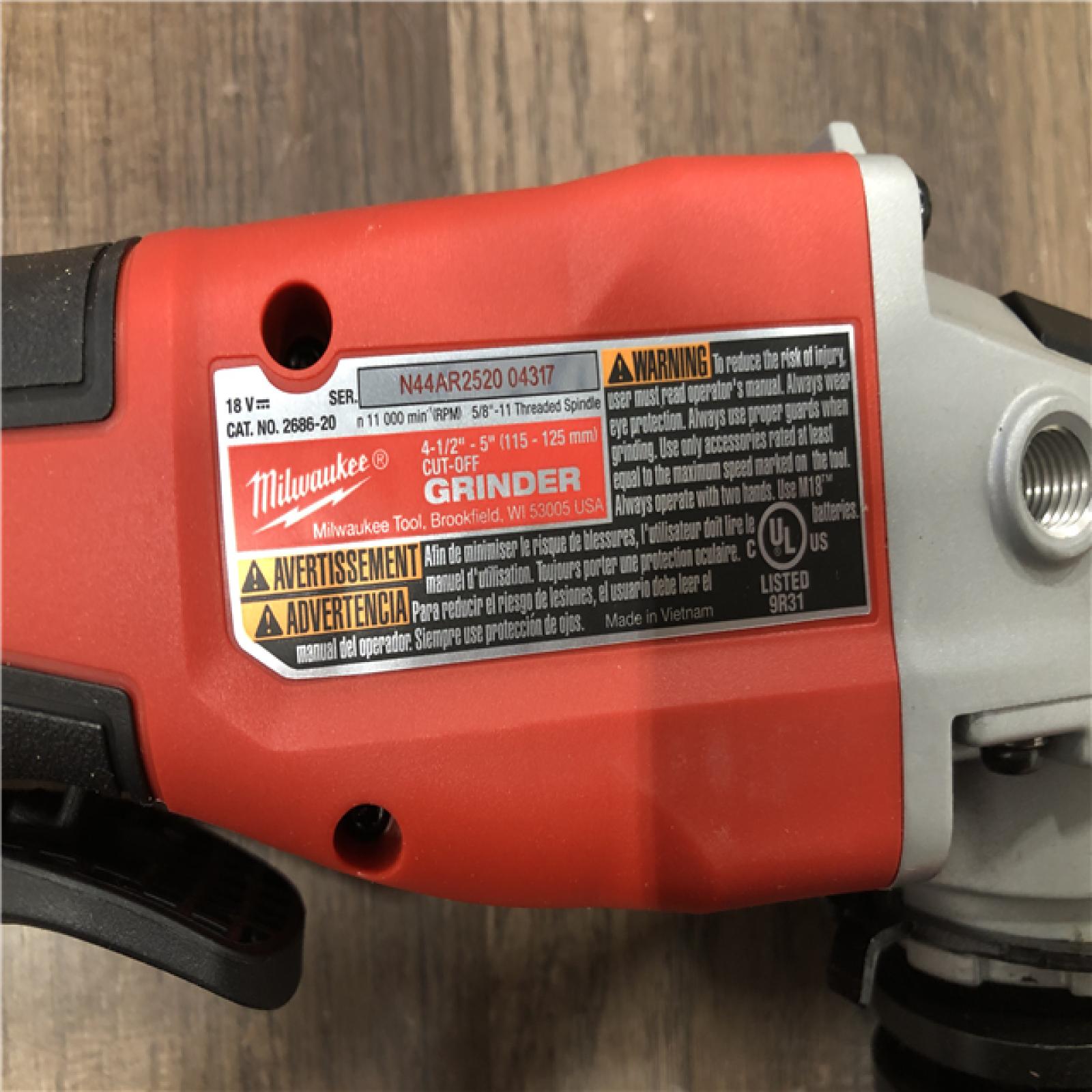 AS-IS Milwaukee 18V Lithium-Ion Brushless Cordless 4-1/2 in./5 in. Grinder w/Paddle Switch (Tool-Only)