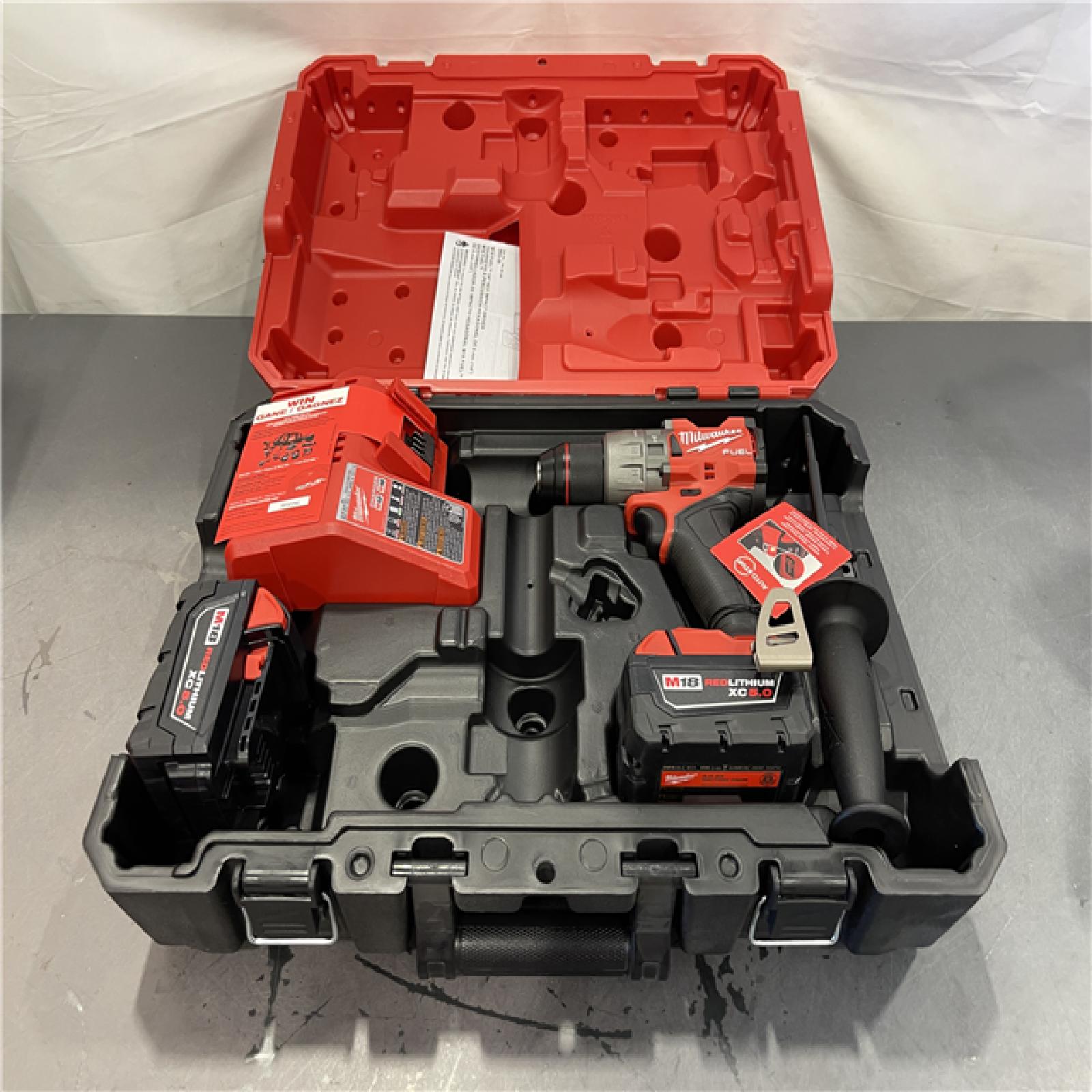 AS-IS - Milwaukee M18 FUEL 18-Volt Lithium-Ion Brushless Cordless 1/2 in. Hammer Drill/Driver Kit