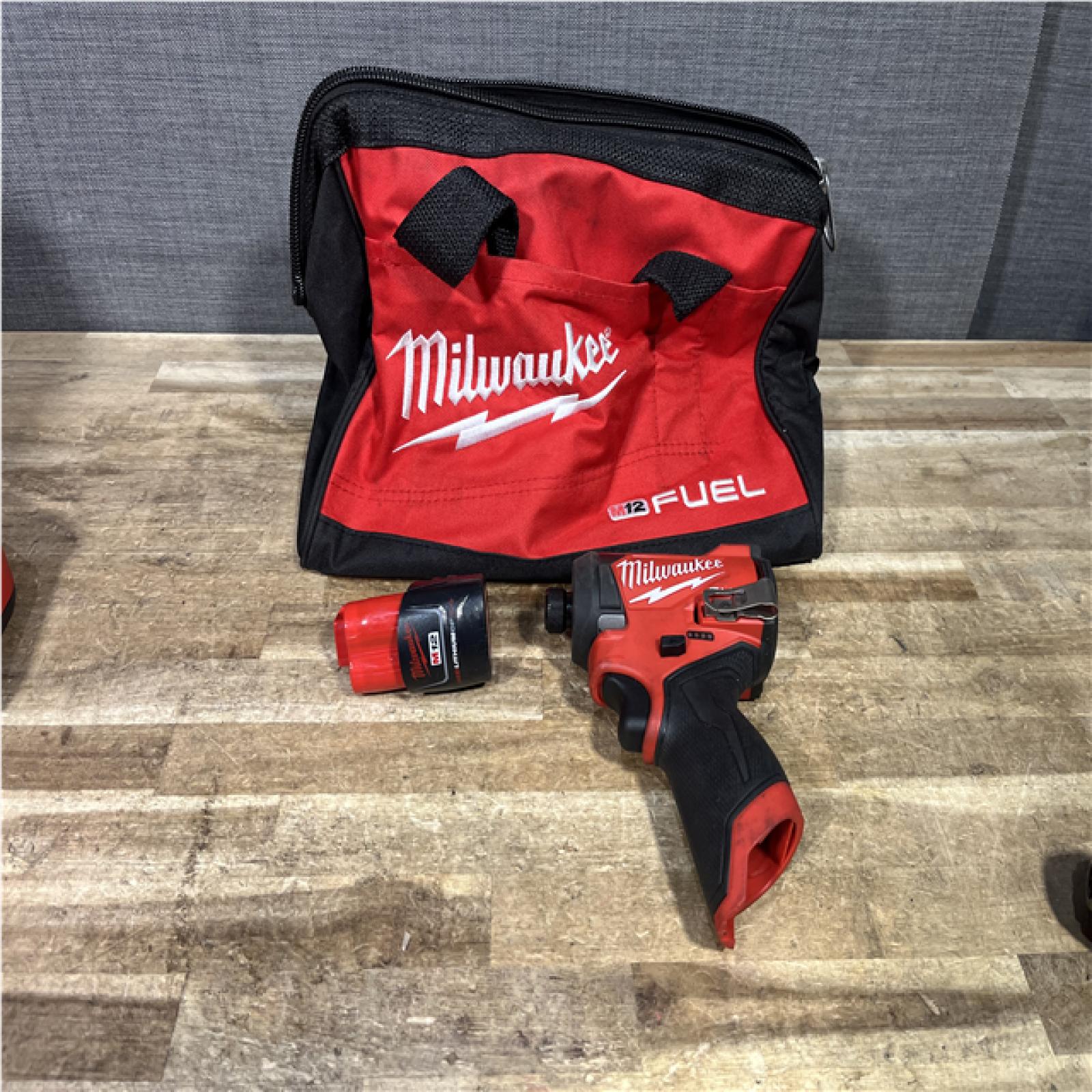 Houston Location AS-IS Milwaukee FUEL Impact Driver and Battery