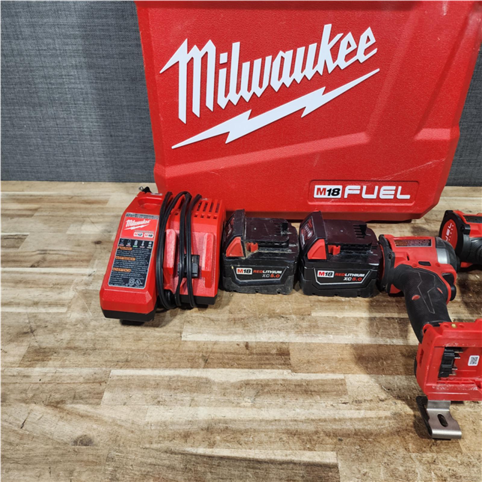 HOUSTON LOCATION - AS - IS Milwaukee 2 Tool Combo Kit W/ (2) Battery & Charger