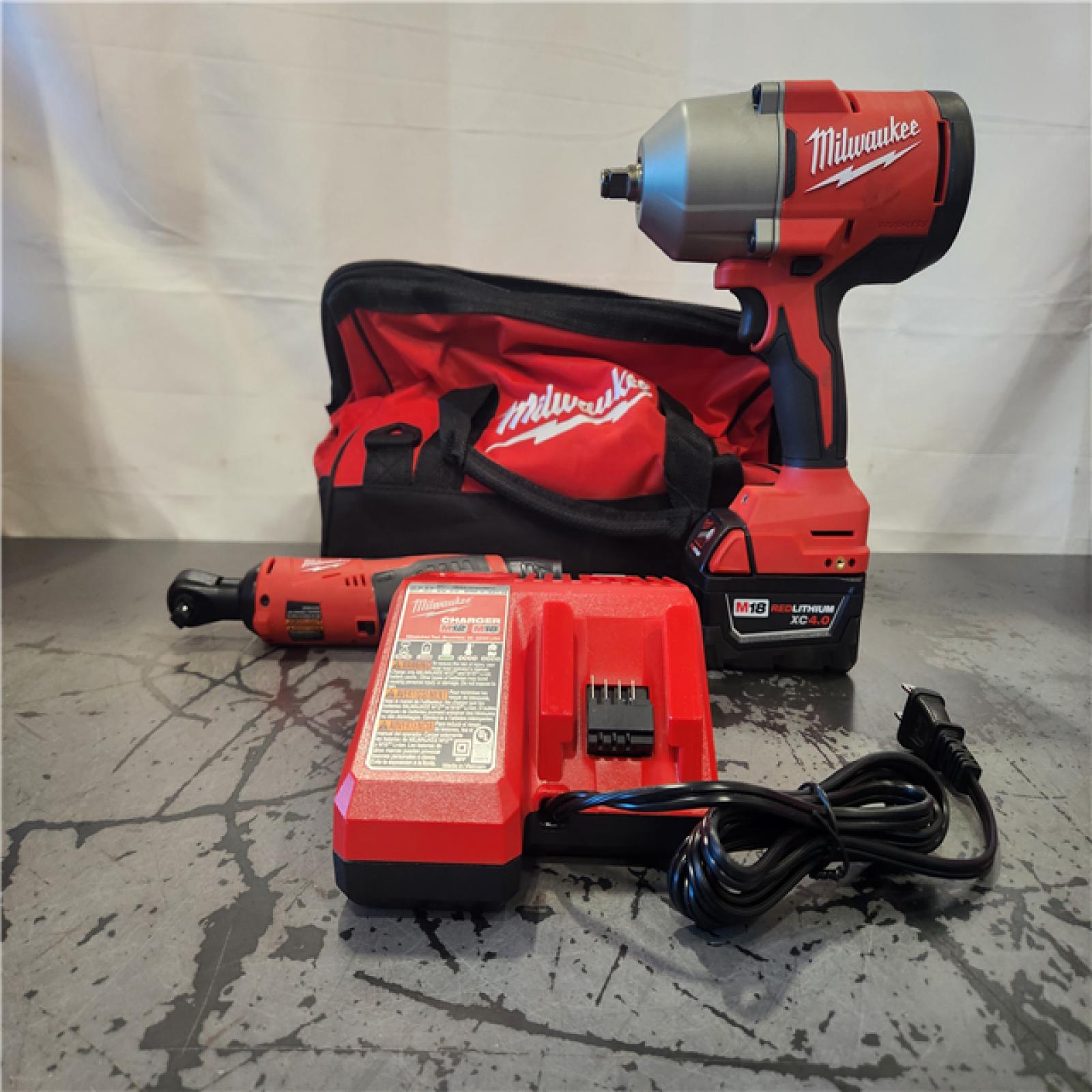 AS-IS- Milwaukee 12/18V Lithium-Ion Cordless 3/8 in. Ratchet and 1/2 in. High Torque Impact Wrench with Friction Ring Combo Kit