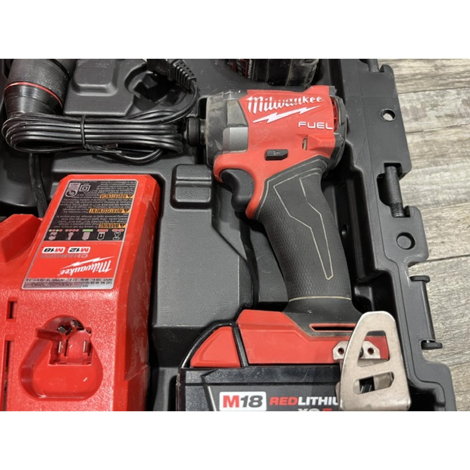 AS-IS Milwaukee FUEL 18V Lithium-Ion Brushless Cordless Hammer Drill and Impact Driver Combo Kit