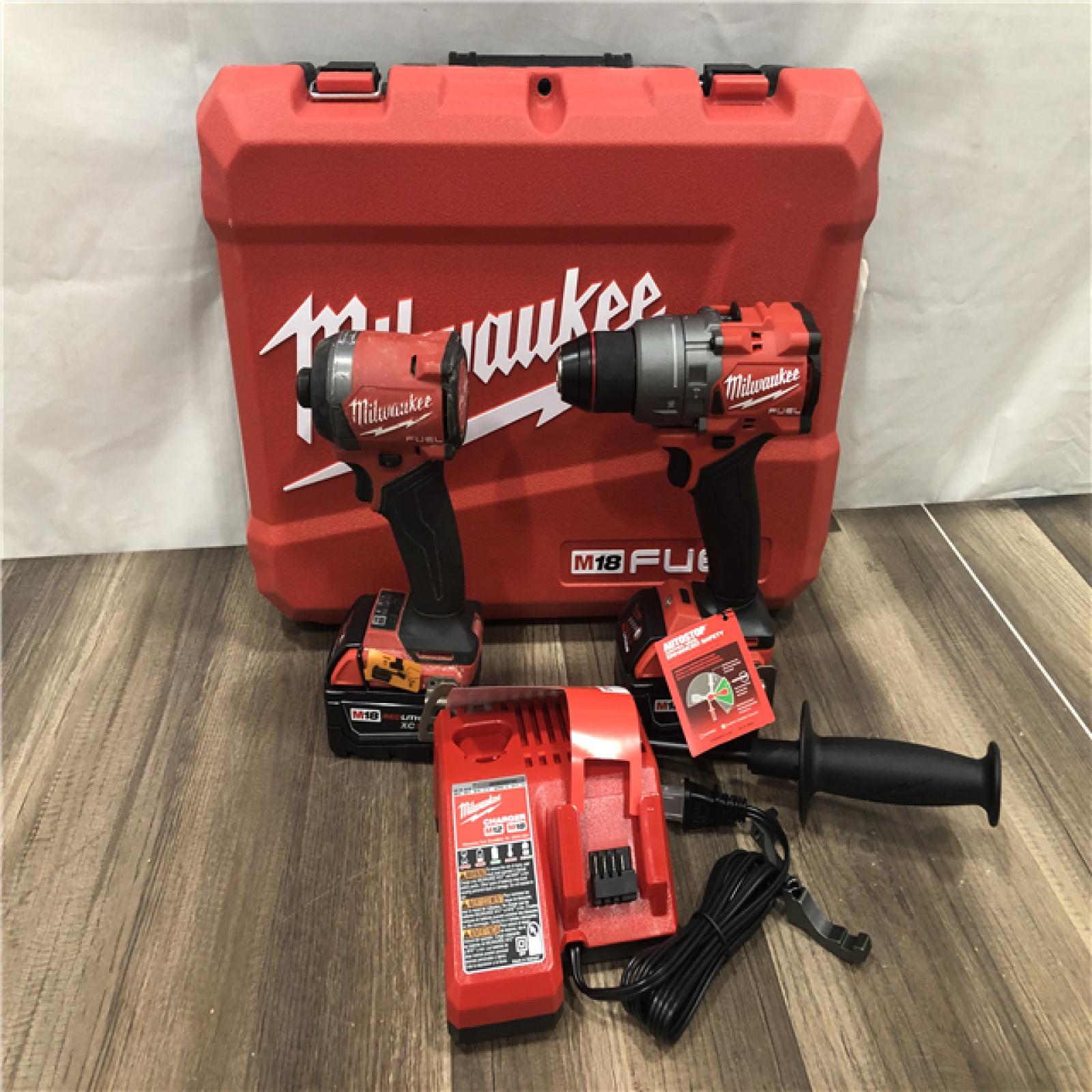 AS-IS Milwaukee  FUEL 18V Lithium-Ion Brushless Cordless Hammer Drill and Impact Driver Combo Kit