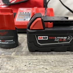 AS-IS Milwaukee FUEL 18V Cordless Mid Torque 1/2 in. Impact Wrench w/ 12 FUEL 3/8 in. Ratchet Combo Kit