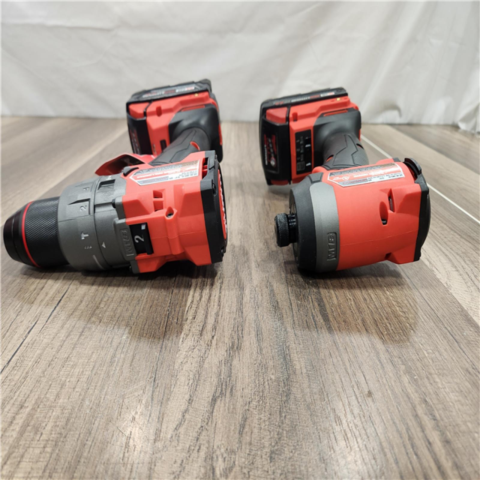 AS-IS- MILWAUKEE FUEL 18V Lithium-Ion Brushless Cordless Hammer Drill and Impact Driver Combo Kit (2-Tool) with 2 Batteries