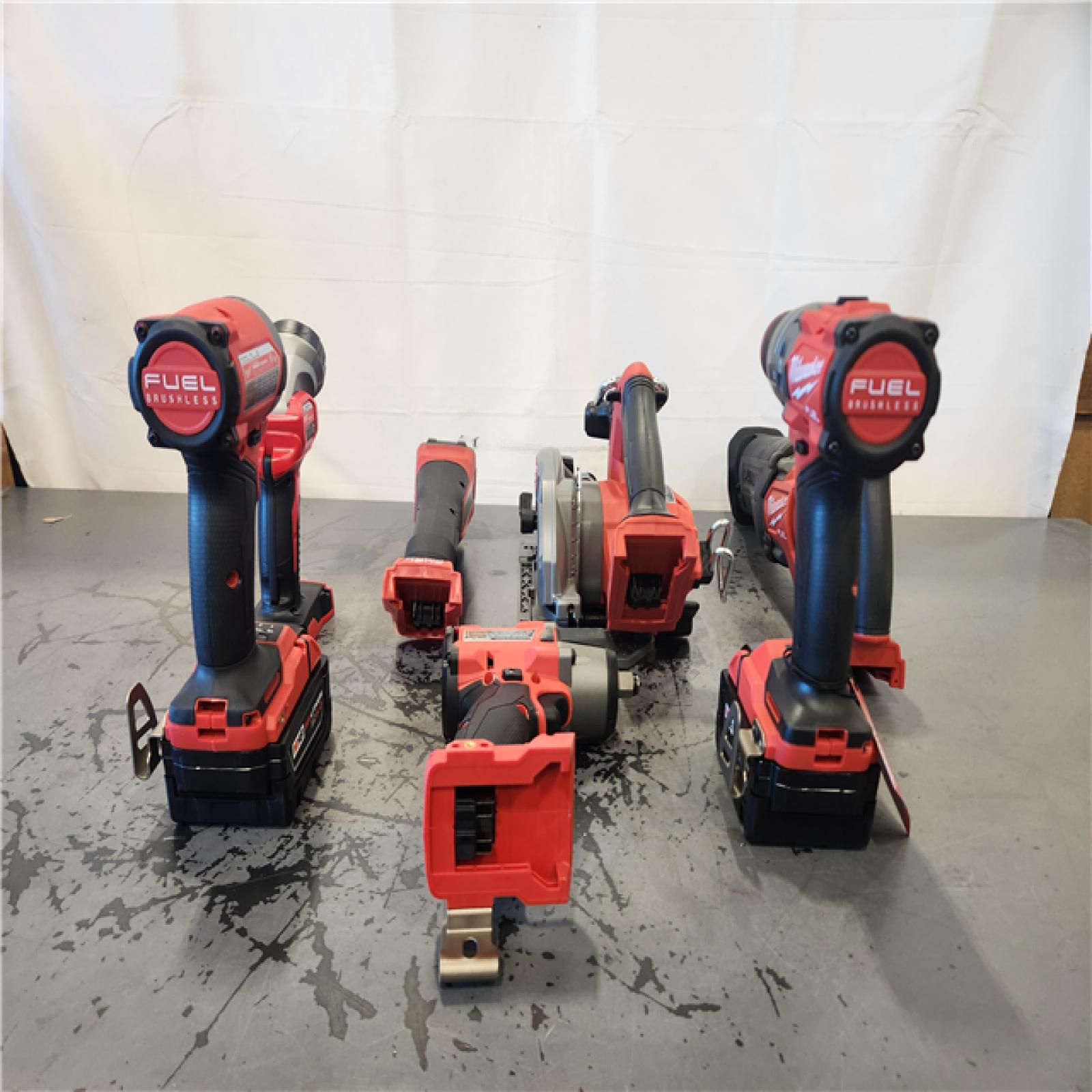 AS-IS- Milwaukee M18 FUEL 18V Lithium-Ion Brushless Cordless Combo Kit with Two 5.0 Ah Batteries  1 Charger  2 Tool Bags (7-Tool)