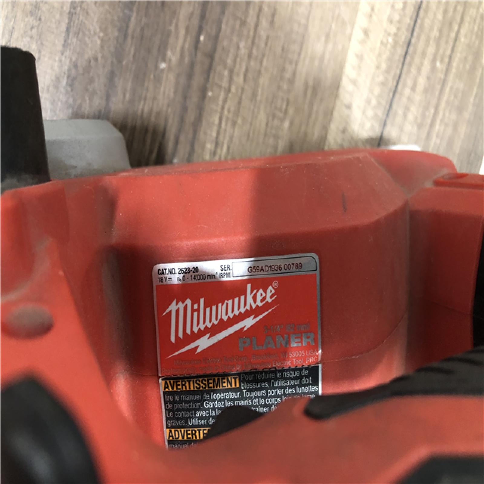 AS-IS Milwaukee M18 18V Lithium-Ion Cordless 3-1/4 in. Planer (Tool-Only)