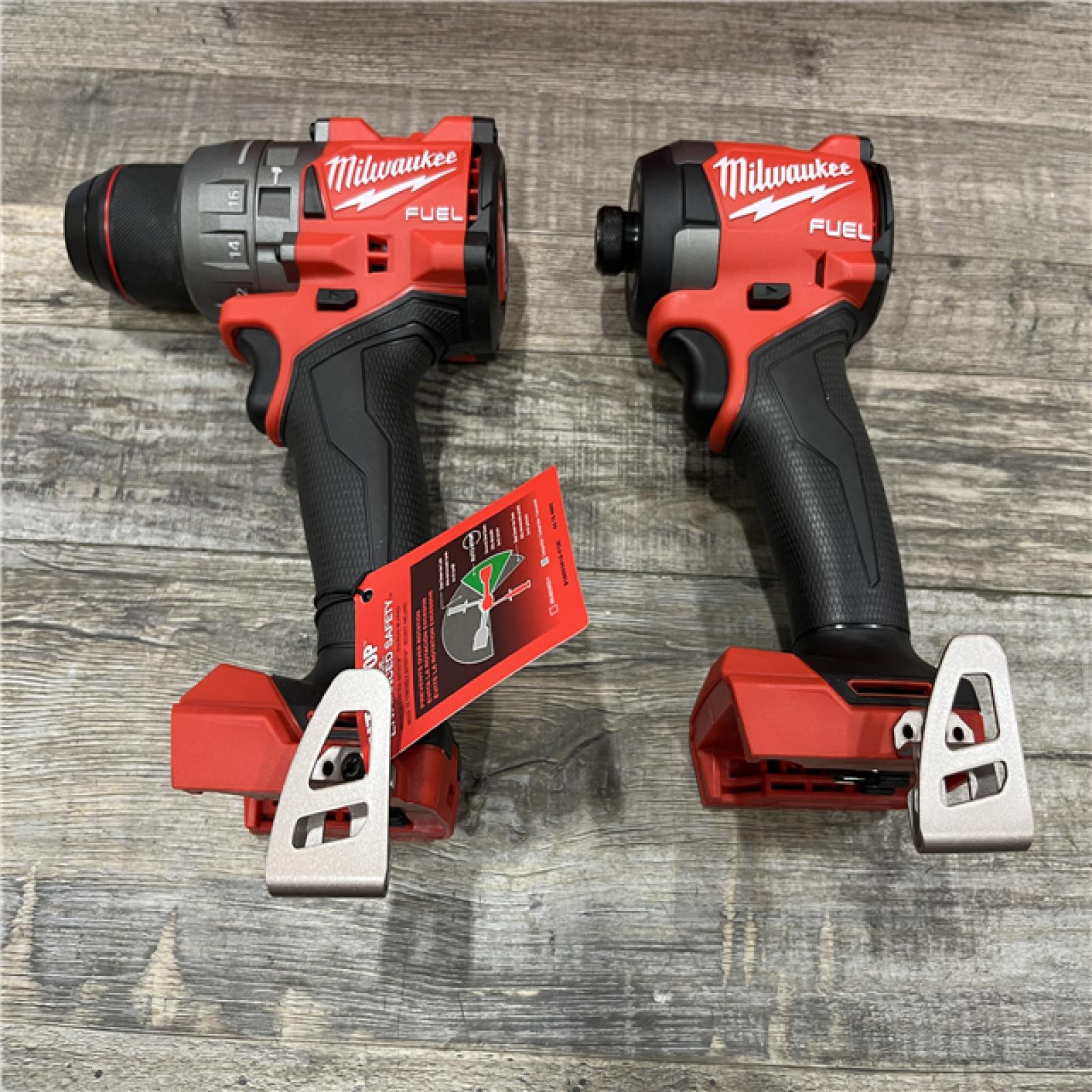 AS-IS Milwaukee FUEL 18V Lithium-Ion Brushless Cordless Hammer Drill and Impact Driver Combo Kit