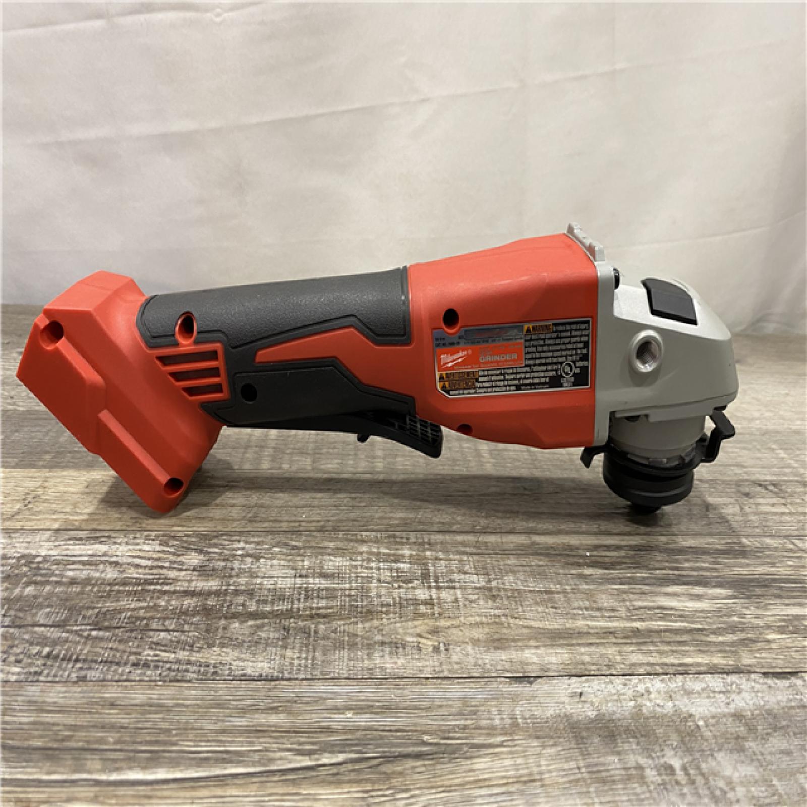 AS-IS Milwaukee 18V Lithium-Ion Brushless Cordless 4-1/2 in./5 in. Grinder w/Paddle Switch (Tool-Only)