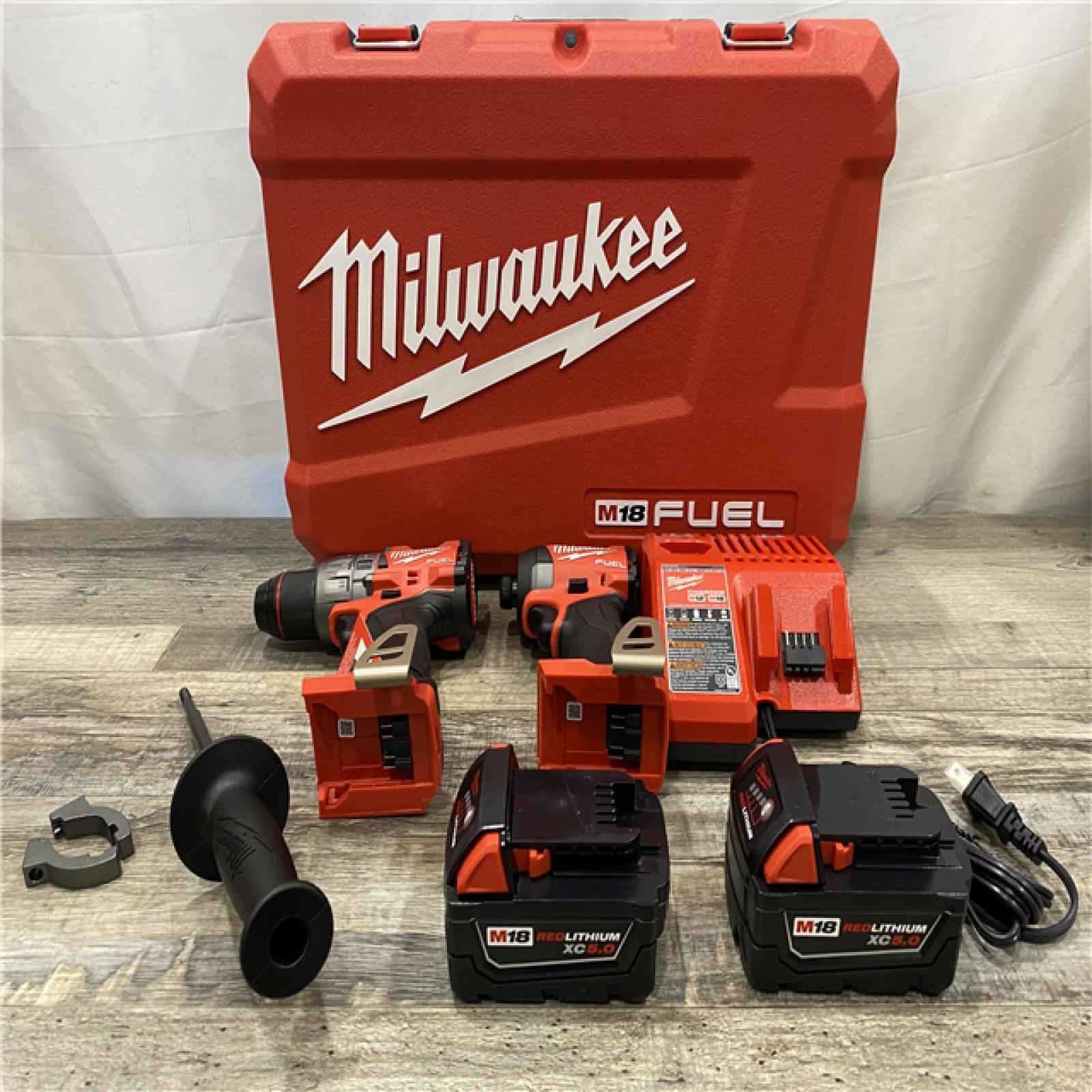 AS-IS Milwaukee FUEL 18V Lithium-Ion Brushless Cordless Hammer Drill and Impact Driver Combo Kit