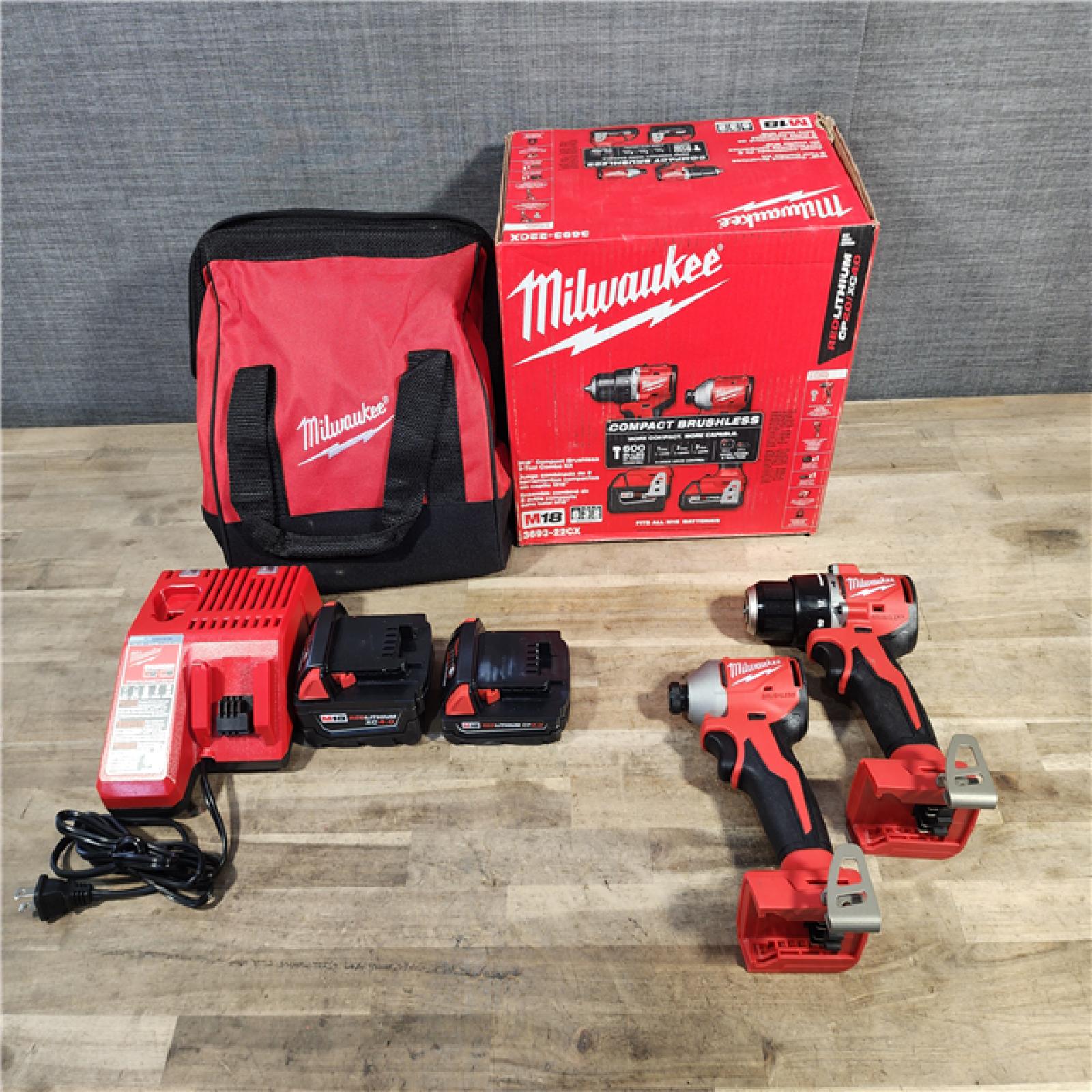 HOUSTON LOCATION - AS-IS M18 18-Volt Lithium-Ion Brushless Cordless Compact Hammer Drill/Impact Combo Kit (2-Tool) with (2) Batteries, Bag