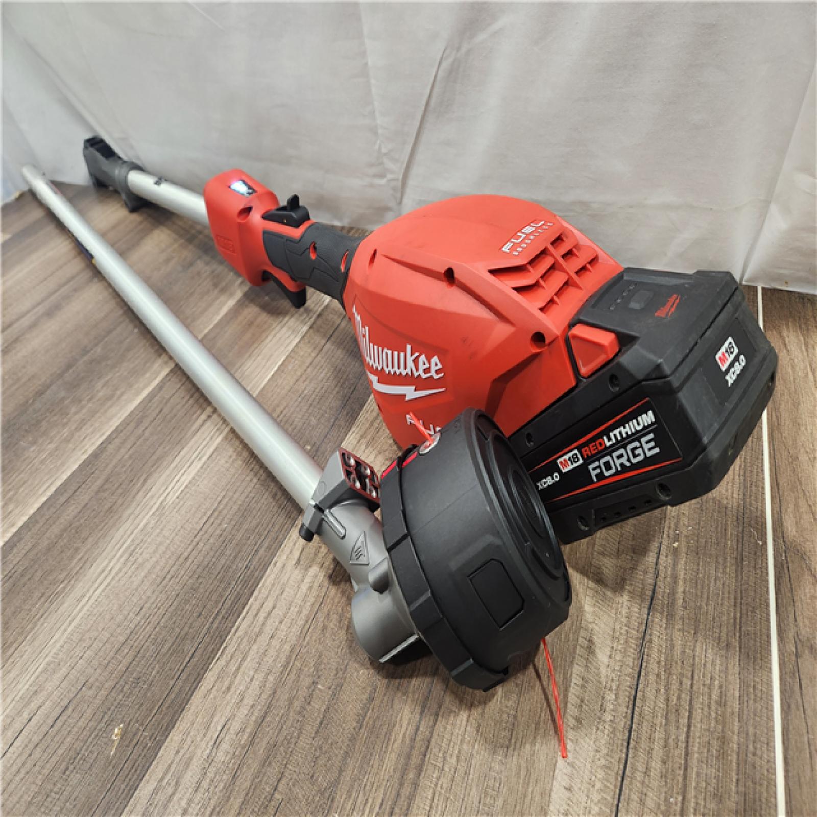 AS-IS- M18 FUEL 18V 16 in. Brushless Cordless Battery Powered String Trimmer W/QUIK-LOK Attachment Capability & 8.0 Ah Battery