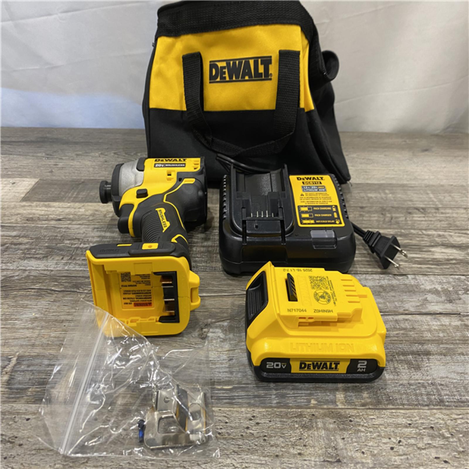 AS-IS DEWALT Atomic 20V Max Lithium-Ion Brushless Cordless Compact 1/4 in. Impact Driver Kit