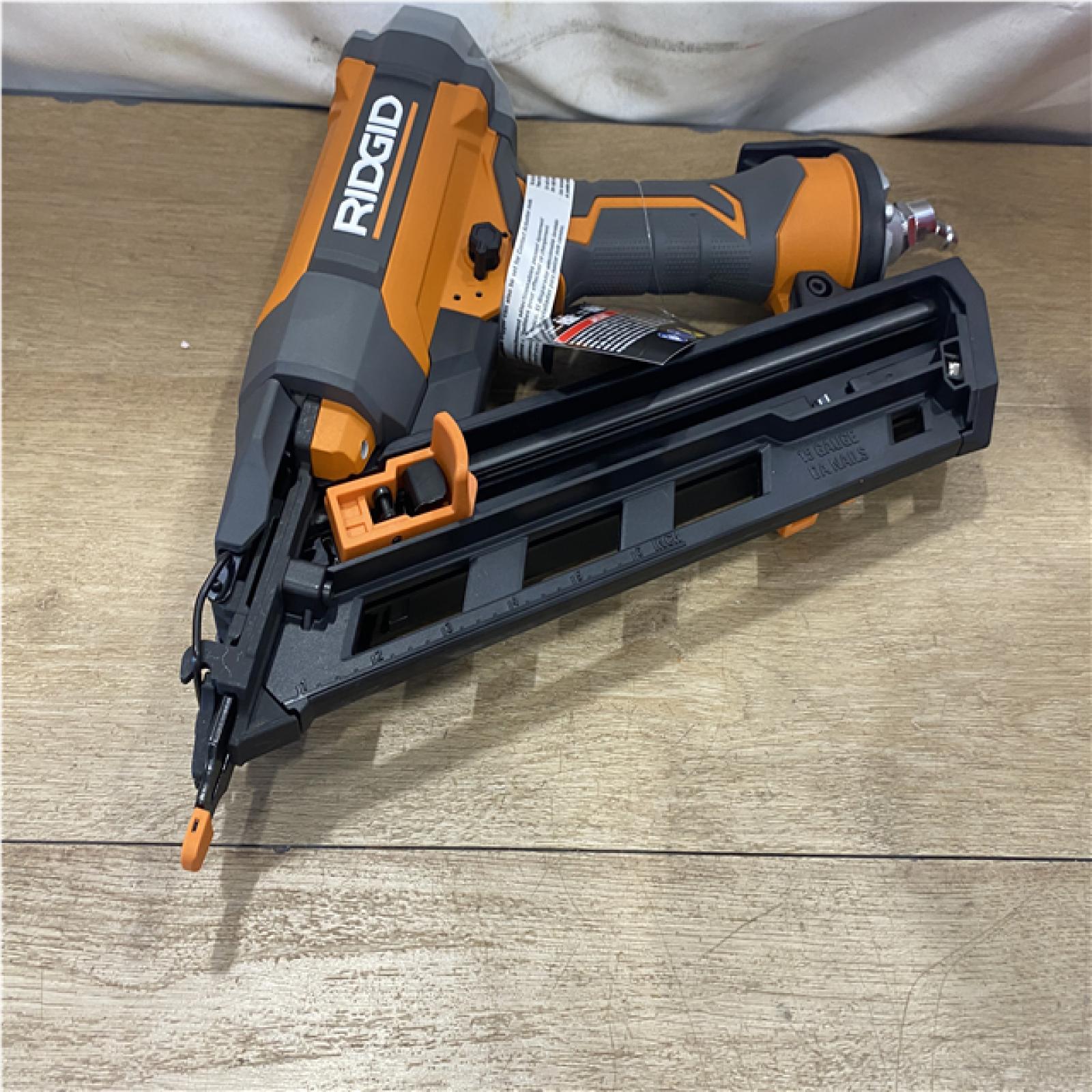 AS-IS Ridgid 15-Gauge 2-1/2 in. Angled Finish Nailer with CLEAN DRIVE Technology  Tool Bag and Sample Nails