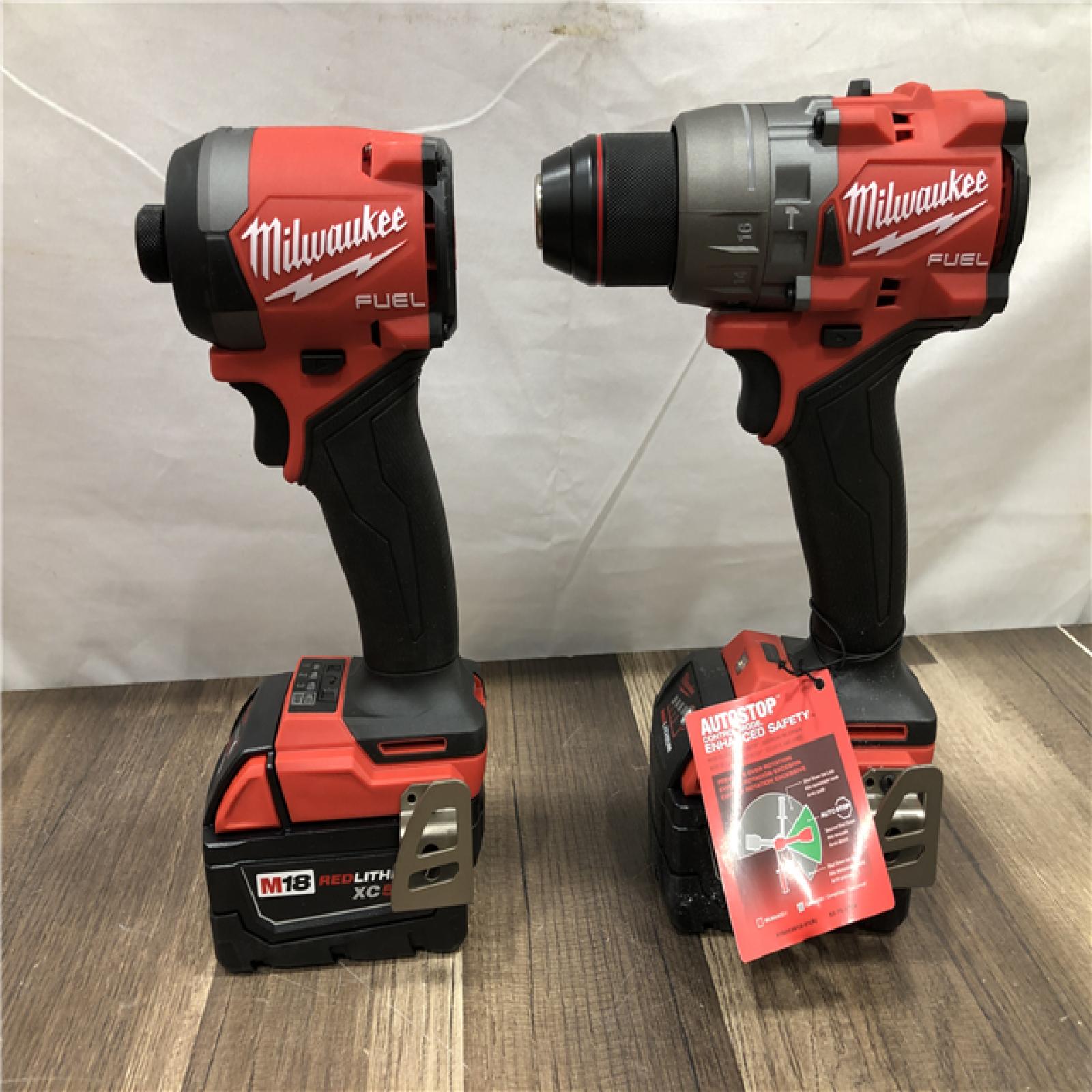 AS-IS Milwaukee FUEL 18V Lithium-Ion Brushless Cordless Hammer Drill and Impact Driver Combo Kit