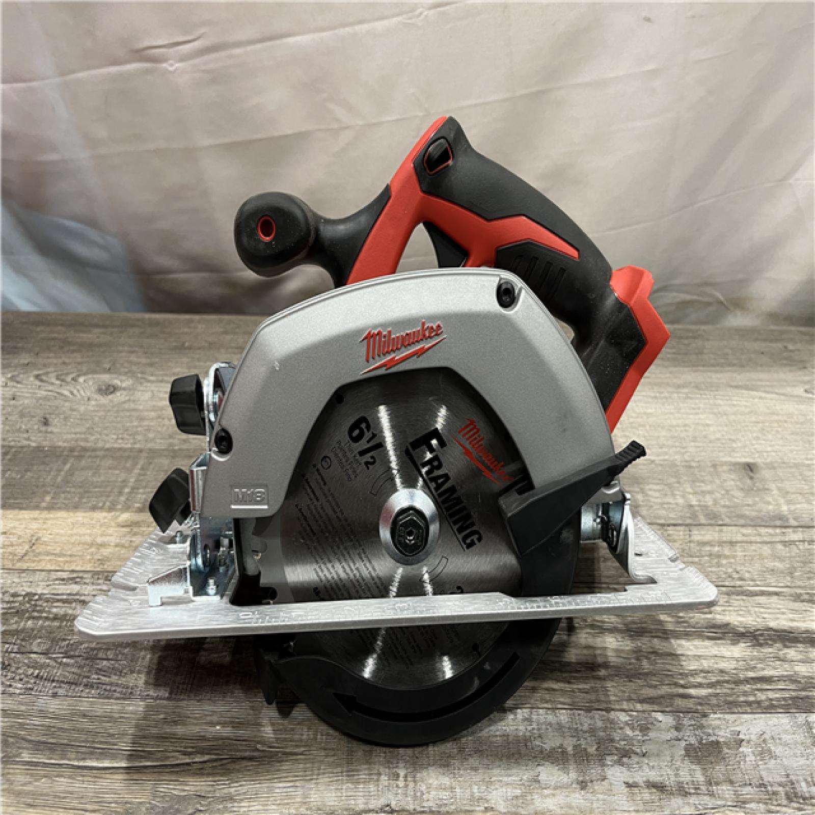 AS-IS Milwaukee 18V Lithium-Ion Cordless 6-1/2 in. Circular Saw (Tool-Only)
