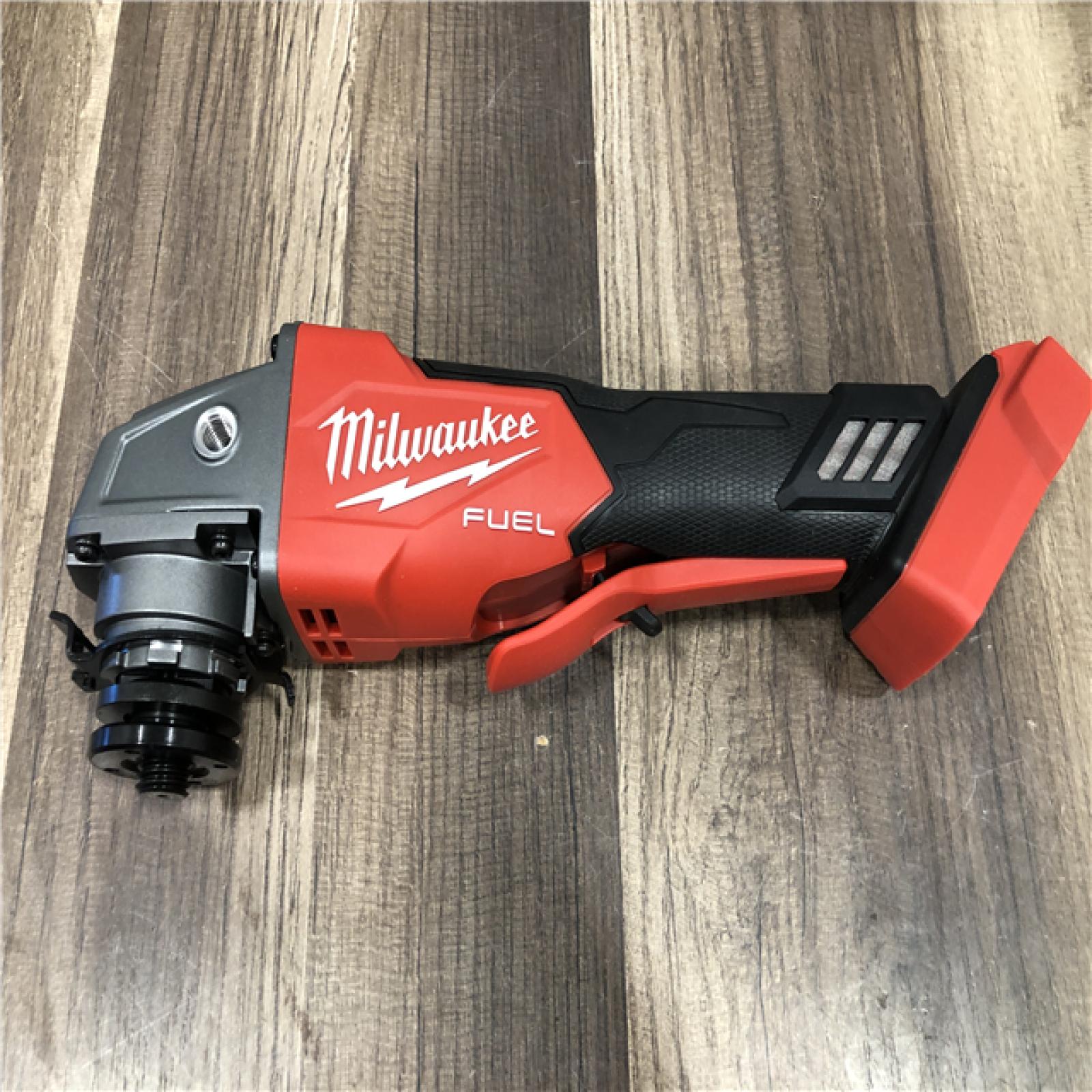 AS-IS Milwaukee FUEL 18V Lithium-Ion Brushless Cordless 4-1/2 in./5 in. Grinder w/Paddle Switch (Tool-Only)