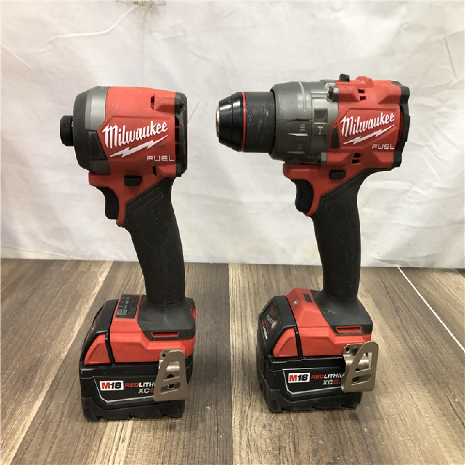 AS-IS Milwaukee FUEL 18V Lithium-Ion Brushless Cordless Hammer Drill and Impact Driver Combo Kit