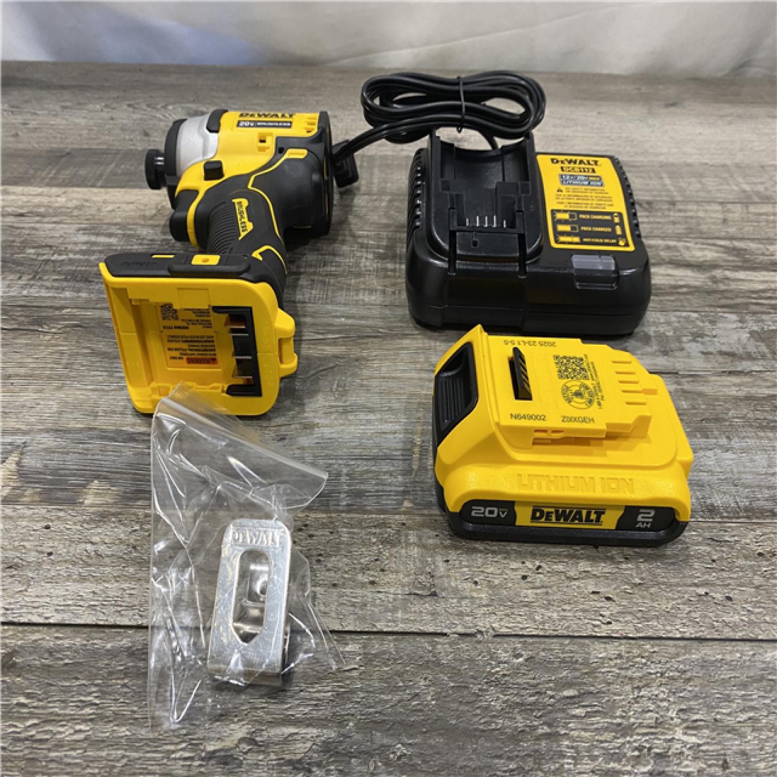 AS-IS DEWALT Atomic 20V Max Lithium-Ion Brushless Cordless Compact 1/4 in. Impact Driver Kit