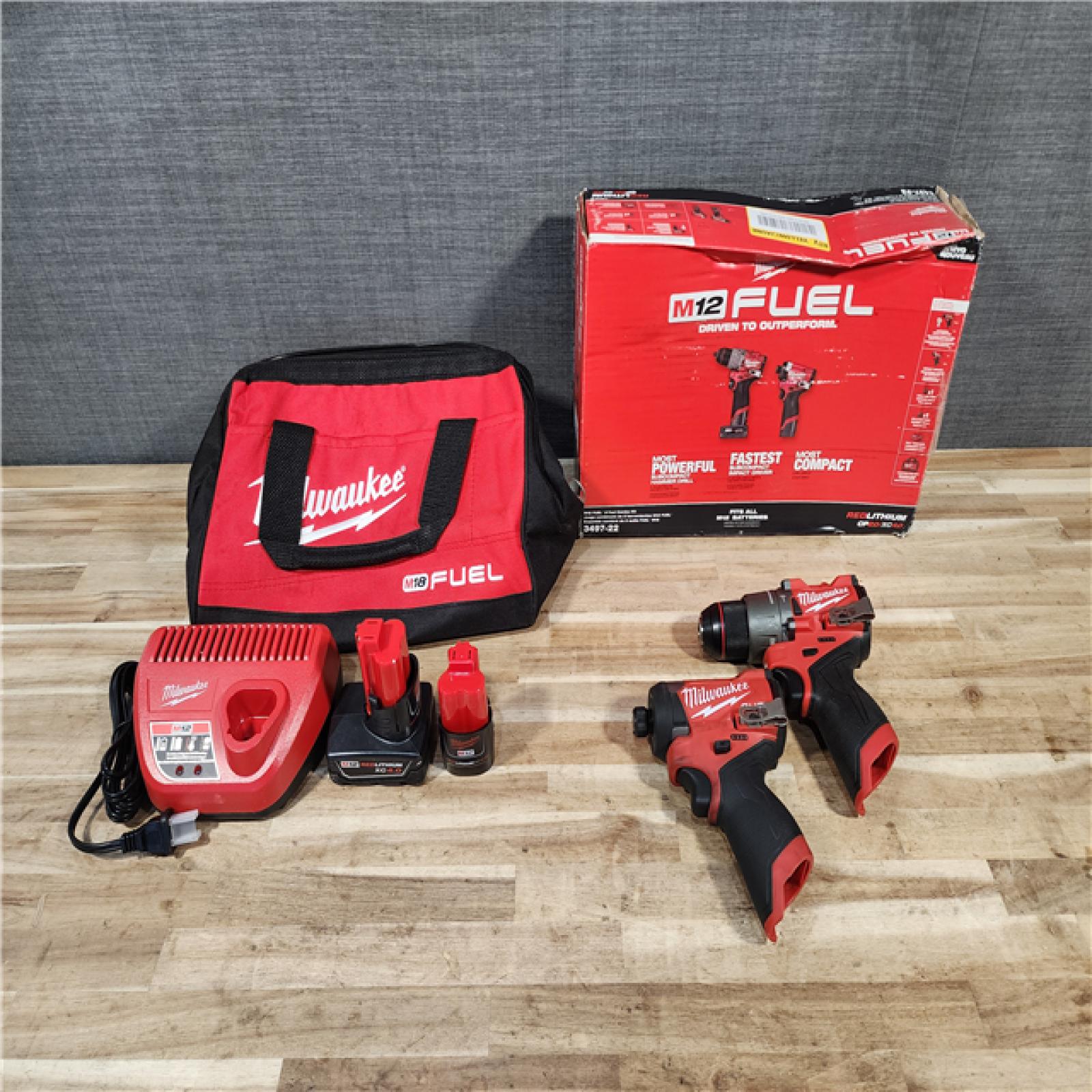 HOUSTON LOCATION - AS-IS Milwaukee  FUEL 12-Volt Lithium-Ion Brushless Cordless Hammer Drill and Impact Driver Combo Kit