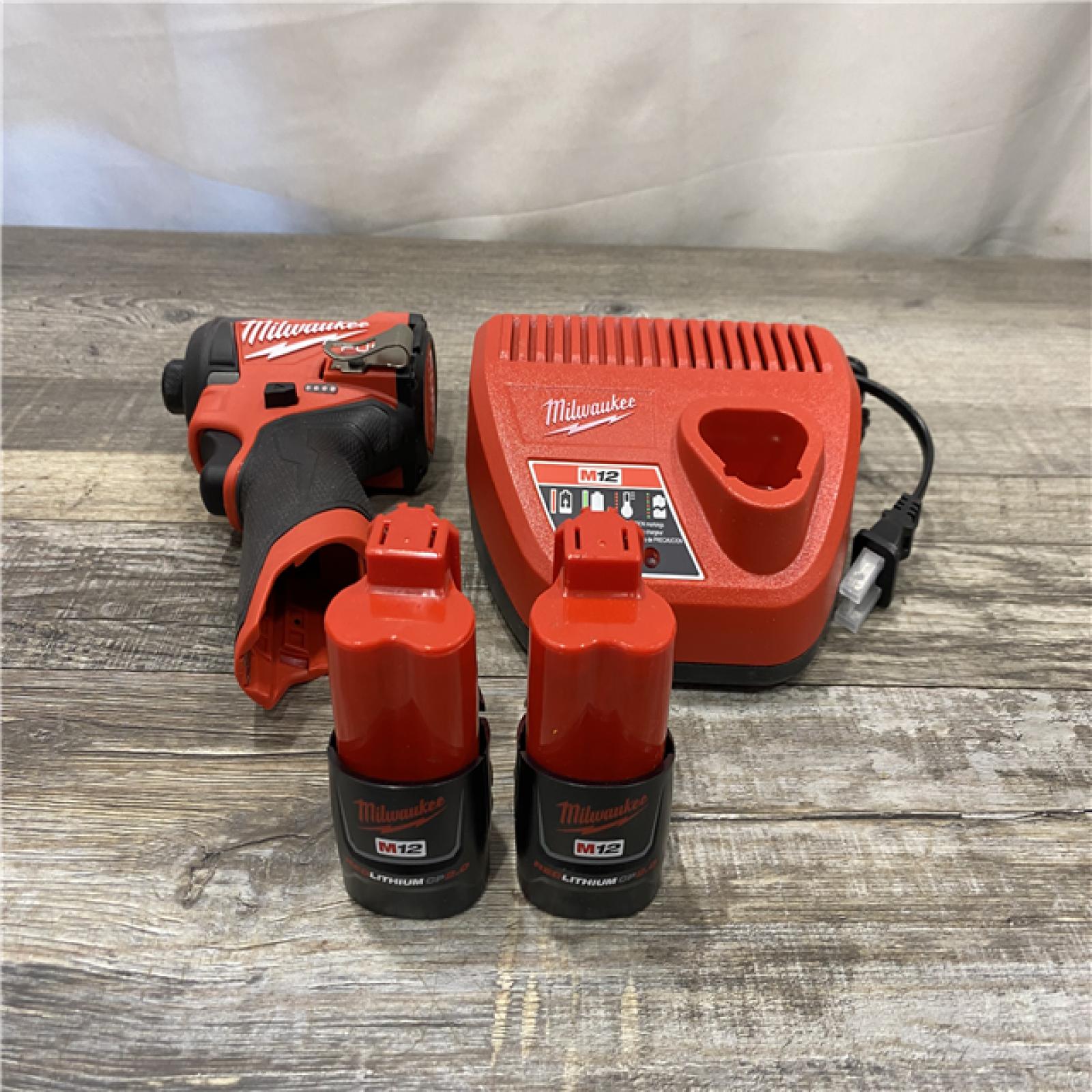AS-IS Milwaukee  FUEL 12V Lithium-Ion Brushless Cordless 1/4 in. Hex Impact Driver Kit