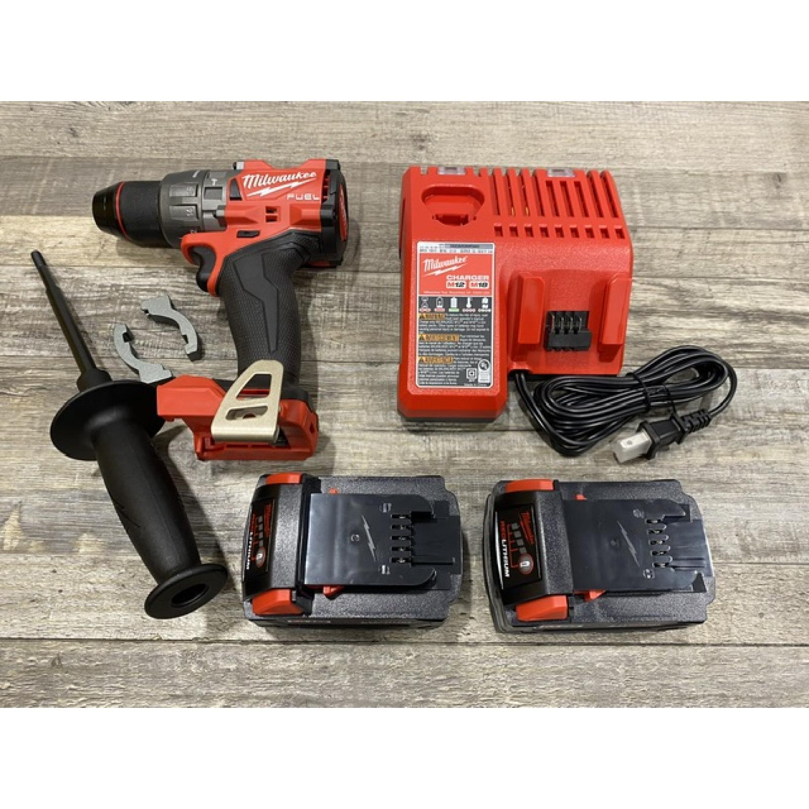 AS-IS Milwaukee FUEL 18V Lithium-Ion Brushless Cordless 1/2 in. Hammer Drill Driver Kit