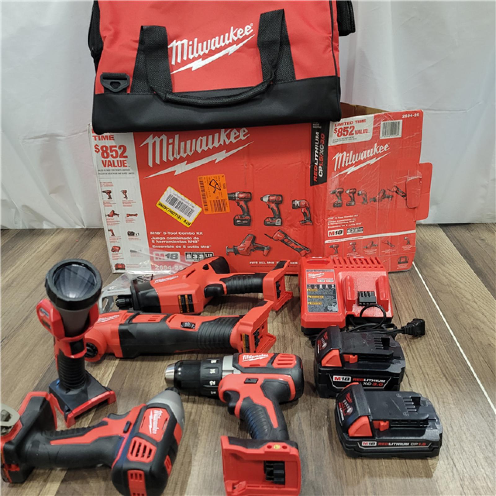 AS-IS Milwaukee M18 18V Lithium-Ion Cordless Combo Kit (5-Tool) with (2) Batteries, Charger and Tool Bag
