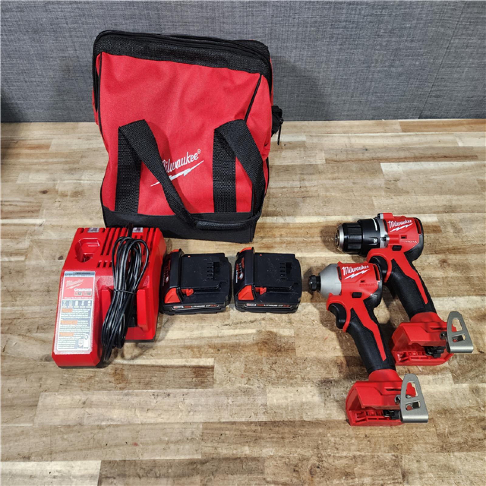 HOUSTON LOCATION - AS - IS Milwaukee 18V Lithium-Ion Brushless Cordless Compact Drill/Impact Combo Kit