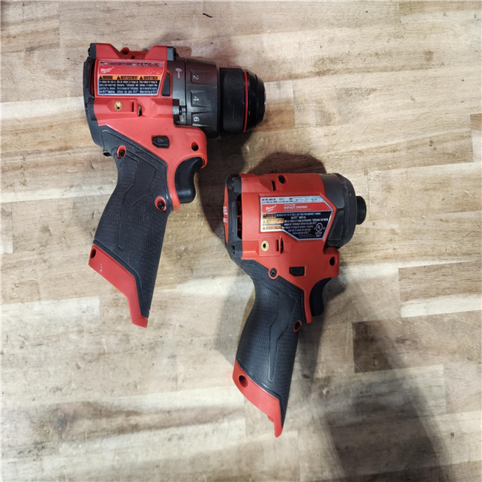 HOUSTON LOCATION - AS-IS Milwaukee FUEL 12-Volt Lithium-Ion Brushless Cordless Hammer Drill and Impact Driver Combo Kit