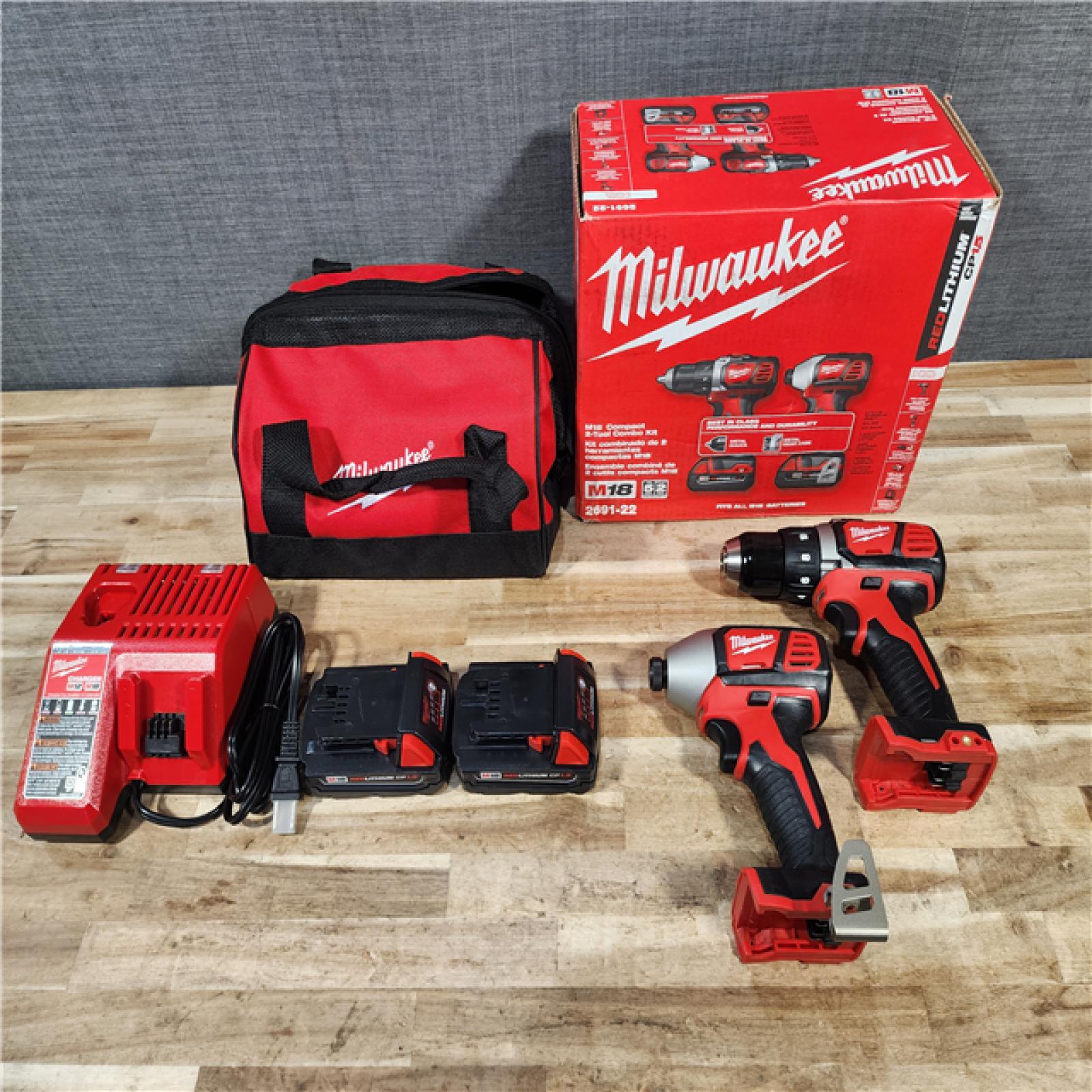 HOUSTON LOCATION - AS-IS Milwaukee 18V Lithium-Ion Cordless Drill Driver/Impact Driver Combo Kit