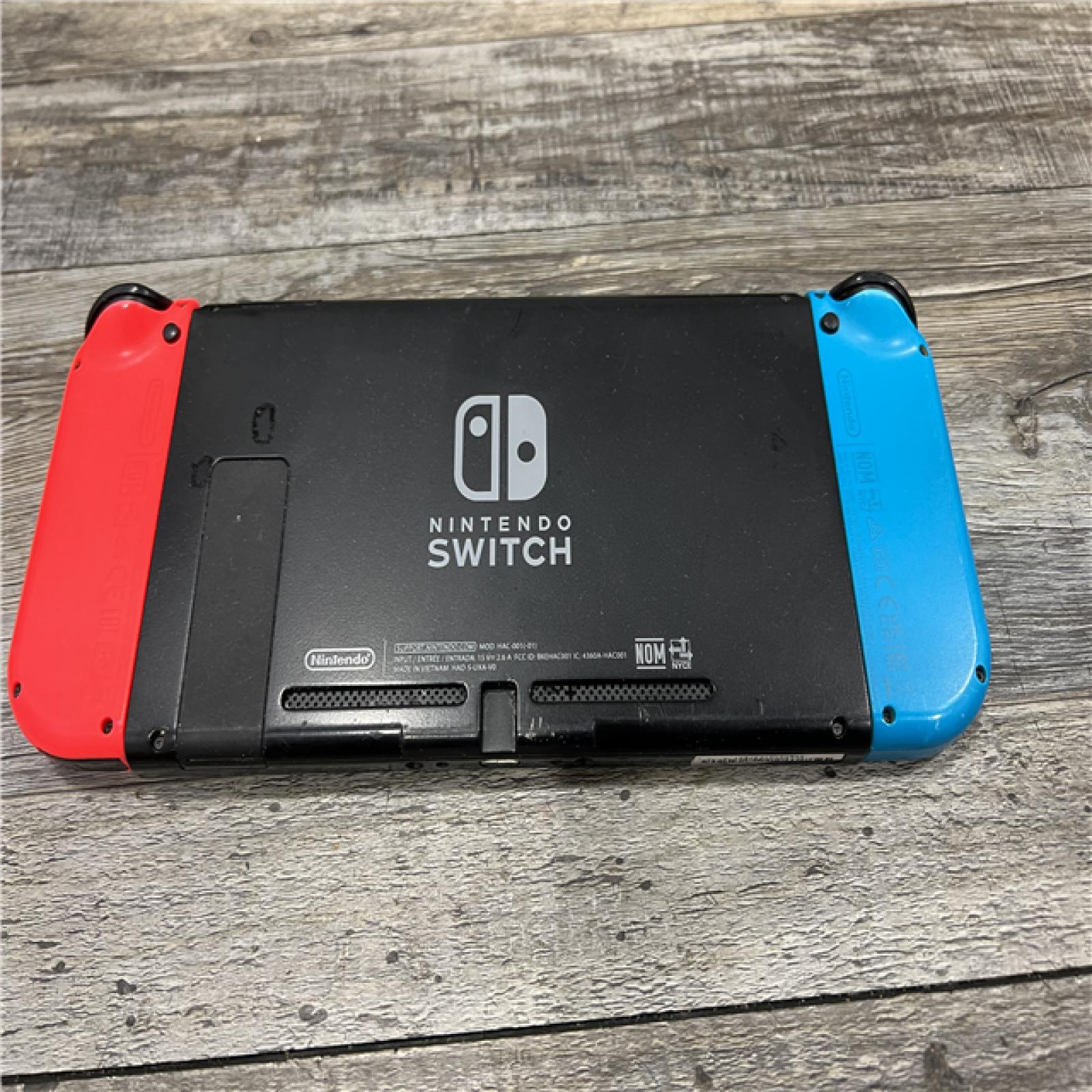 AS-IS Nintendo Switch with Neon Blue and Neon Red Joy-Con