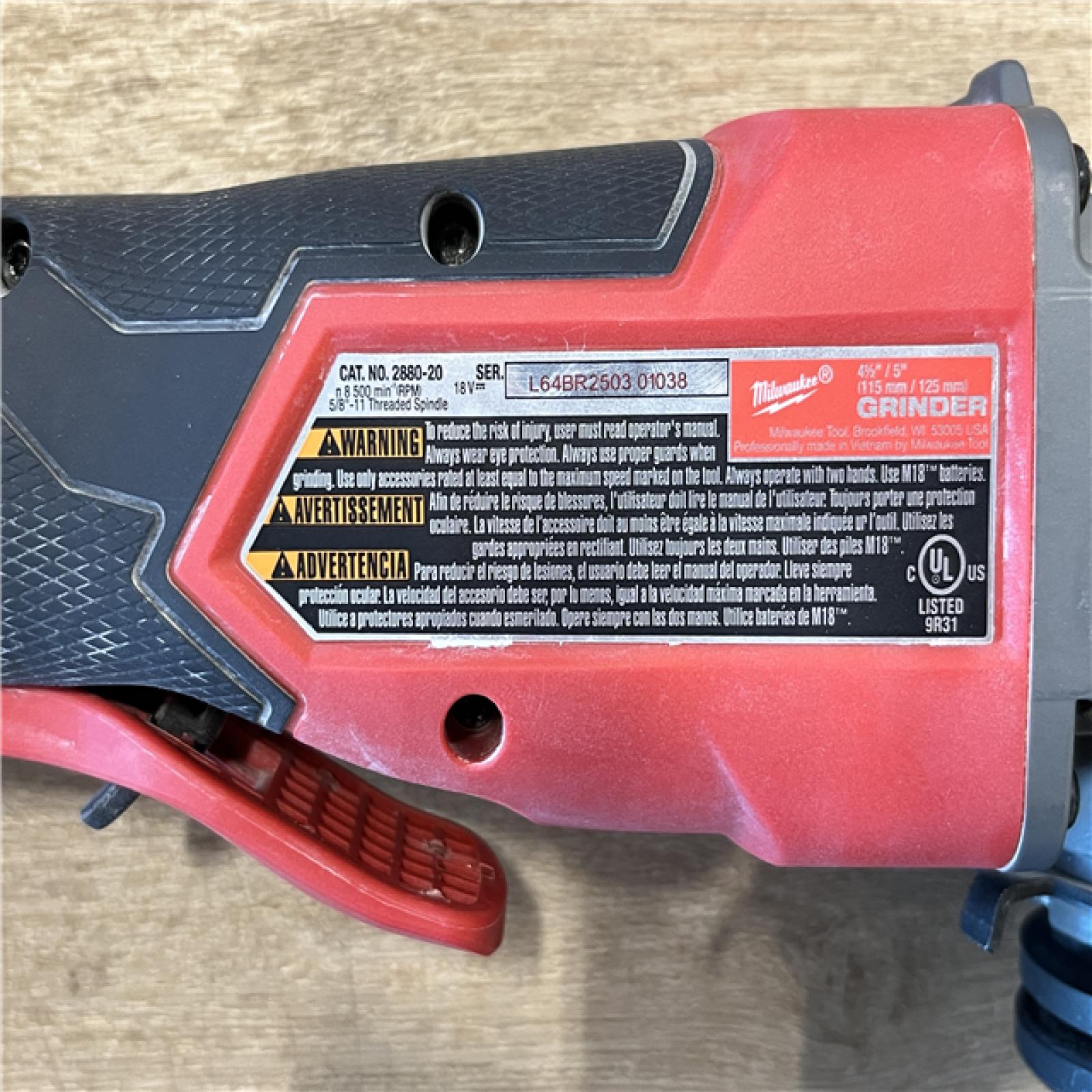 AS-IS Milwaukee FUEL 18V Lithium-Ion Brushless Cordless 4-1/2 in./5 in. Grinder w/Paddle Switch (Tool-Only)