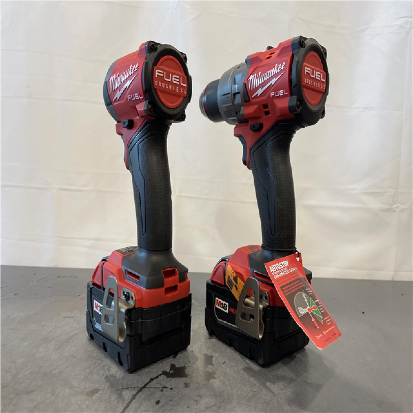 AS-IS - MILWAUKEE FUEL 18V Lithium-Ion Brushless Cordless Hammer Drill and Impact Driver Combo Kit