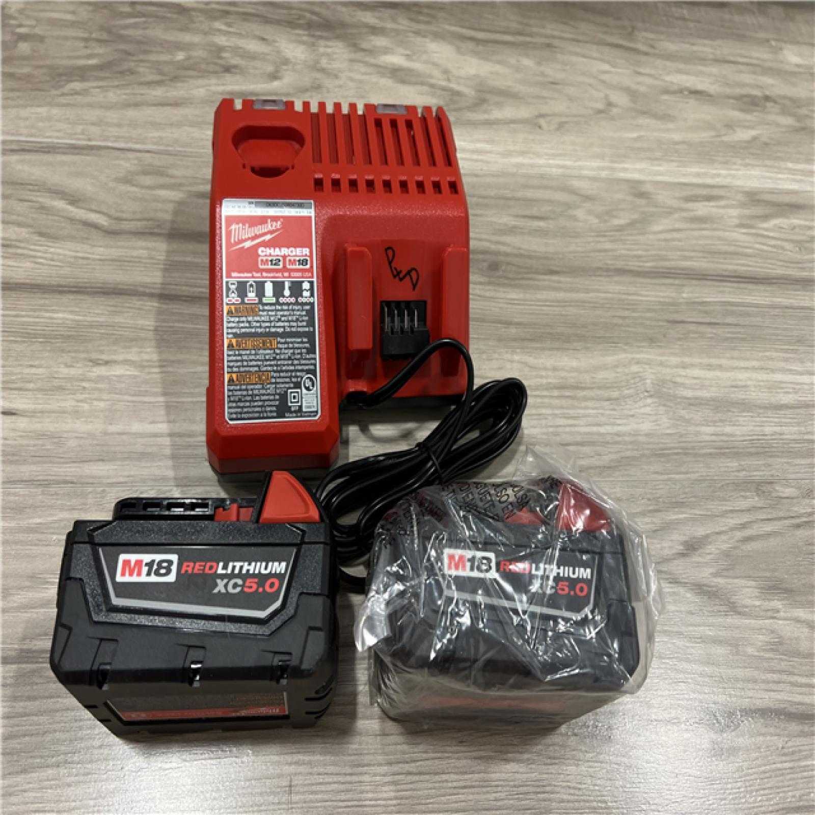 AS-IS Milwaukee M18 REDLITHIUM XC5.0 Battery Starter Kit â€“ (2) 5.0Ah Batteries & M18/M12 Charger  2.5X Runtime  REDLINK Intelligence  Cold Weather Perform