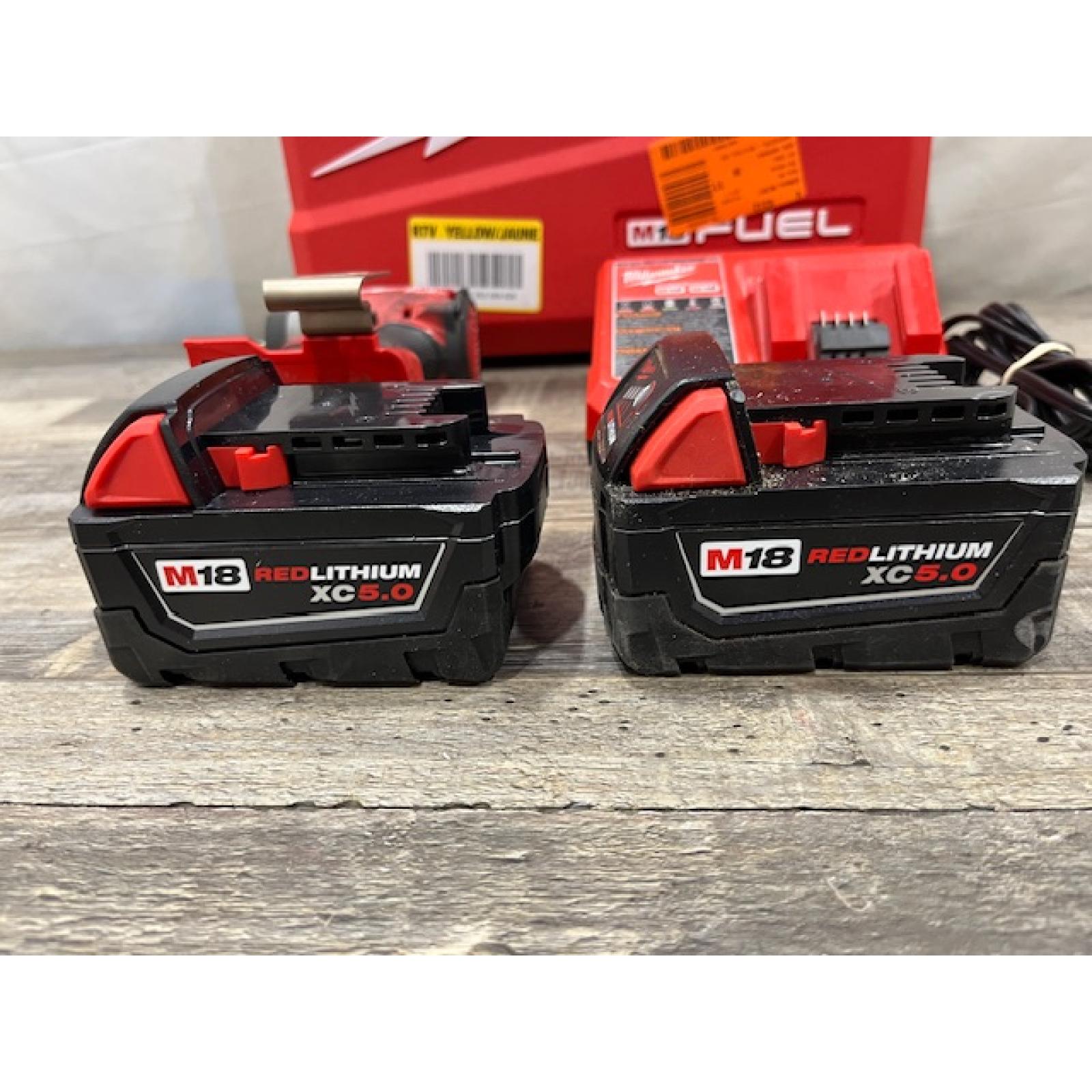 AS-IS Milwaukee FUEL 18V Lithium-Ion Brushless Cordless 3/8 in. Compact Impact Wrench Kit