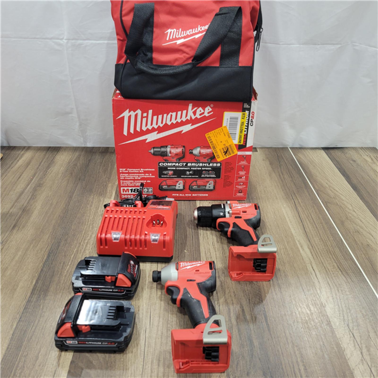 AS-IS Milwaukee M18 18V Lithium-Ion Brushless Cordless Compact Drill/Impact Combo Kit (2-Tool) W/(2) 2.0 Ah Batteries, Charger & Bag