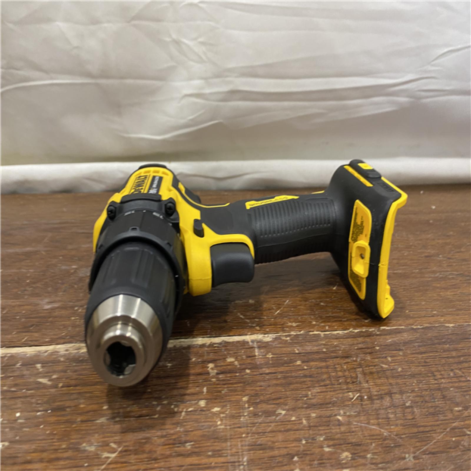 AS-IS ATOMIC 20V MAX Cordless Brushless Compact 1/2 in. Drill/Driver, (2) 20V 1.3Ah Batteries, Charger and Bag
