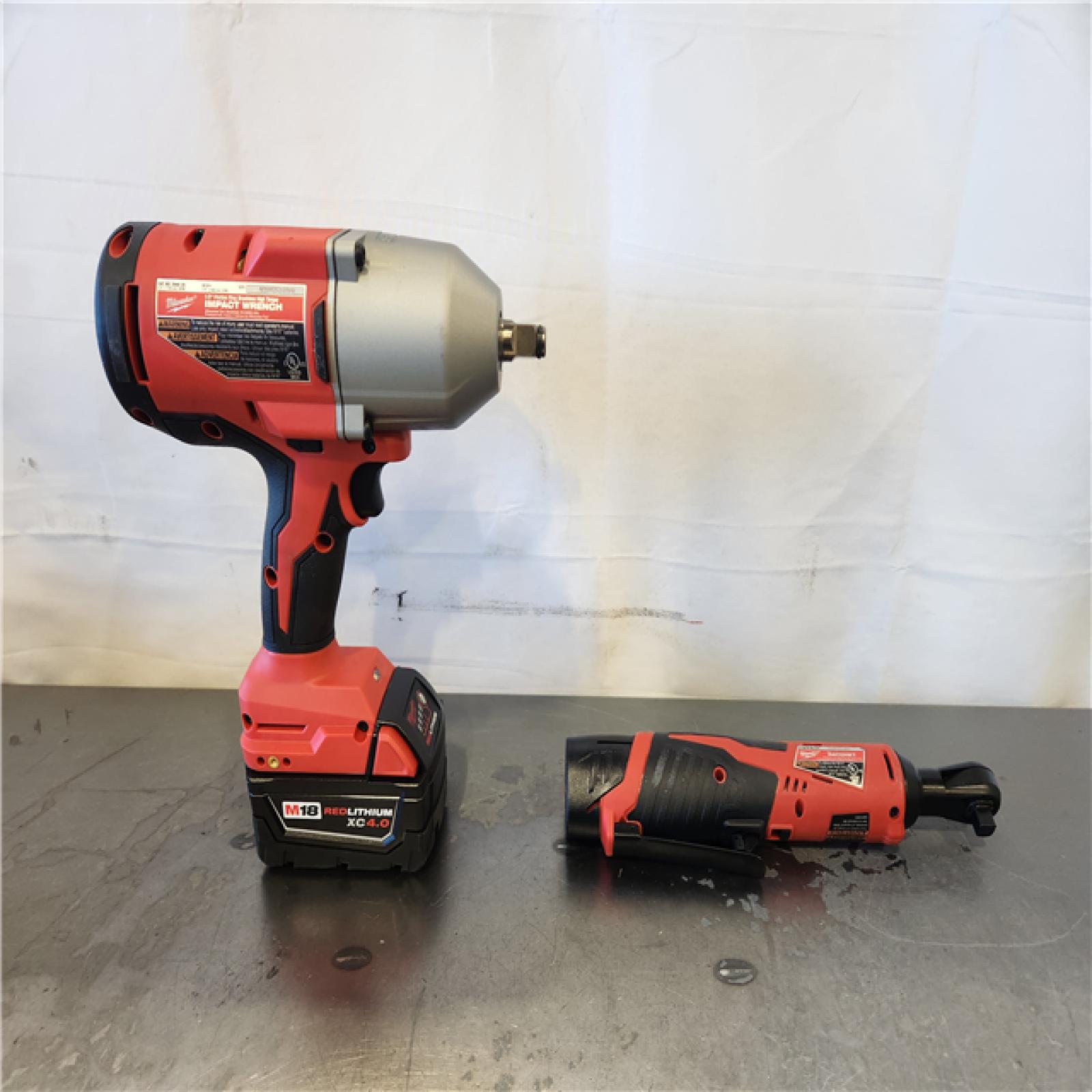 AS-IS- Milwaukee 12/18V Lithium-Ion Cordless 3/8 in. Ratchet and 1/2 in. High Torque Impact Wrench with Friction Ring Combo Kit