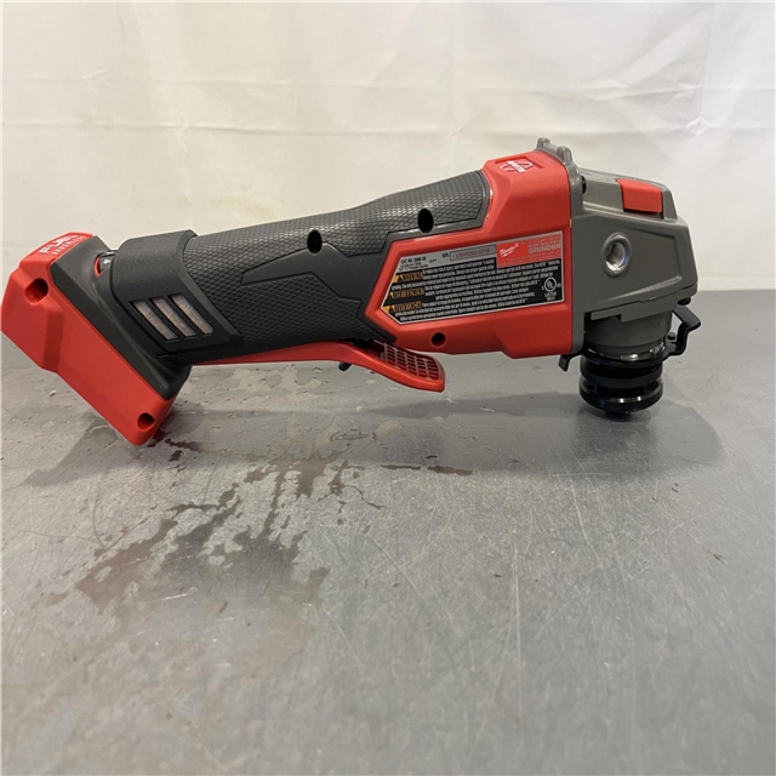 AS-IS - Milwaukee M18 FUEL 18V Lithium-Ion Brushless Cordless 4-1/2 in./5 in. Grinder with Variable Speed & Paddle Switch
